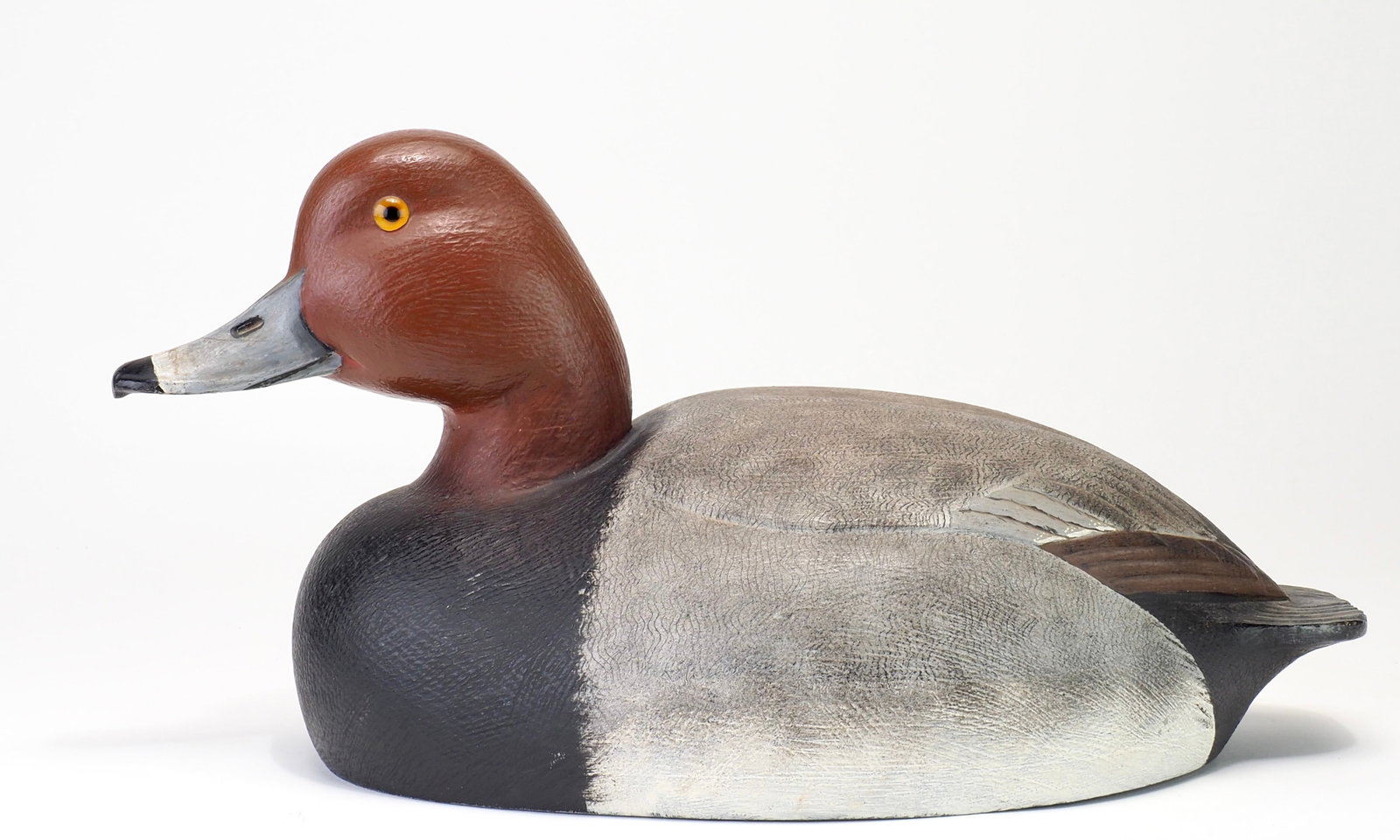 Nick Purdo - Competition Redhead Drake: Nick Purdo Detroit, MI c.1968 16" long Primarily regarded as a working decoy carver, very few, if any of his high grade competition decoys ever surface. Making this hollow carved example a rare