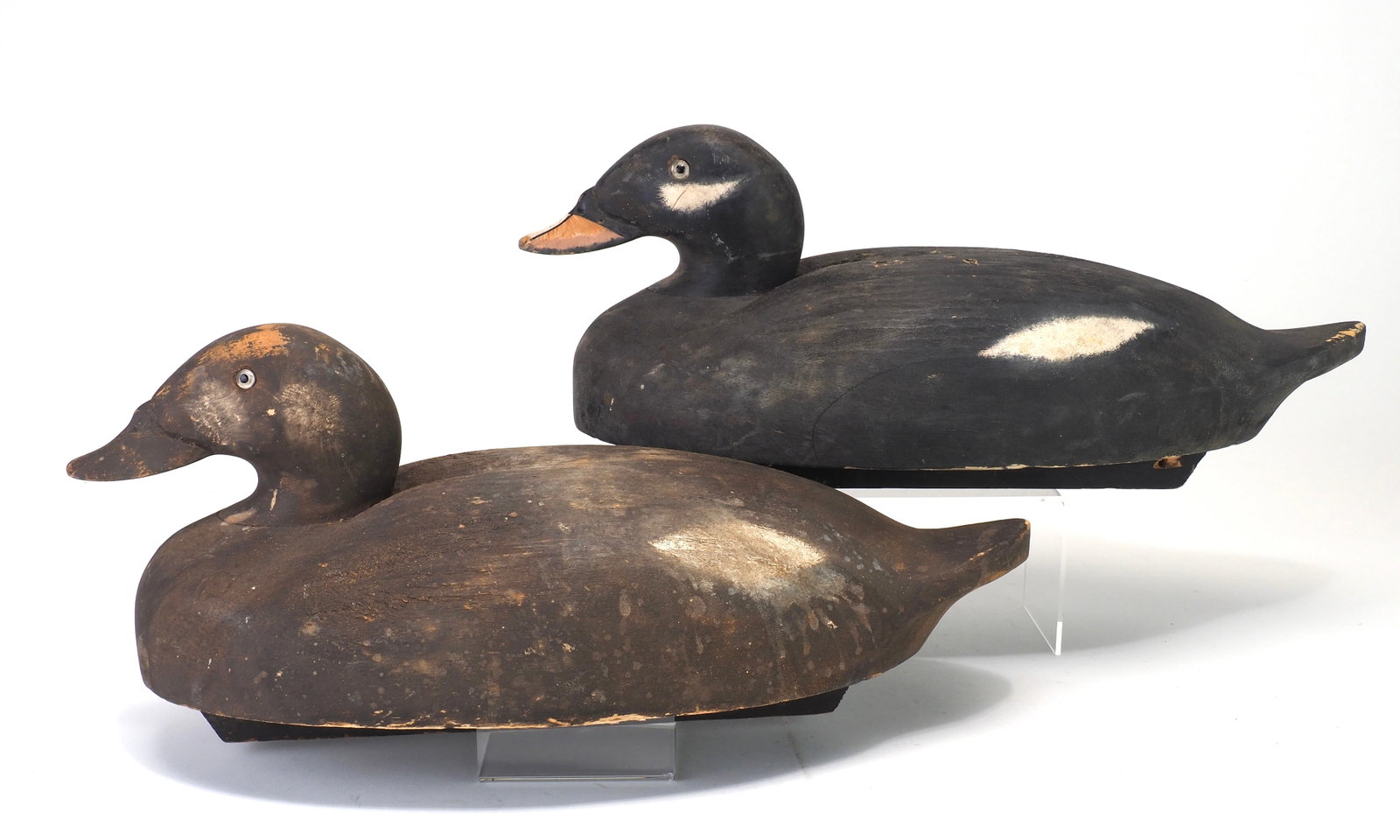 Old Saybrook Wildfowler - Rare Surf Scoter Decoys: Wildfowler Decoy Factory Old Saybrook, CT 15.5" long Rare pair of scoters with their original keels. Glass eyes and species specific carved bills. Condition: Good and original with even wear across