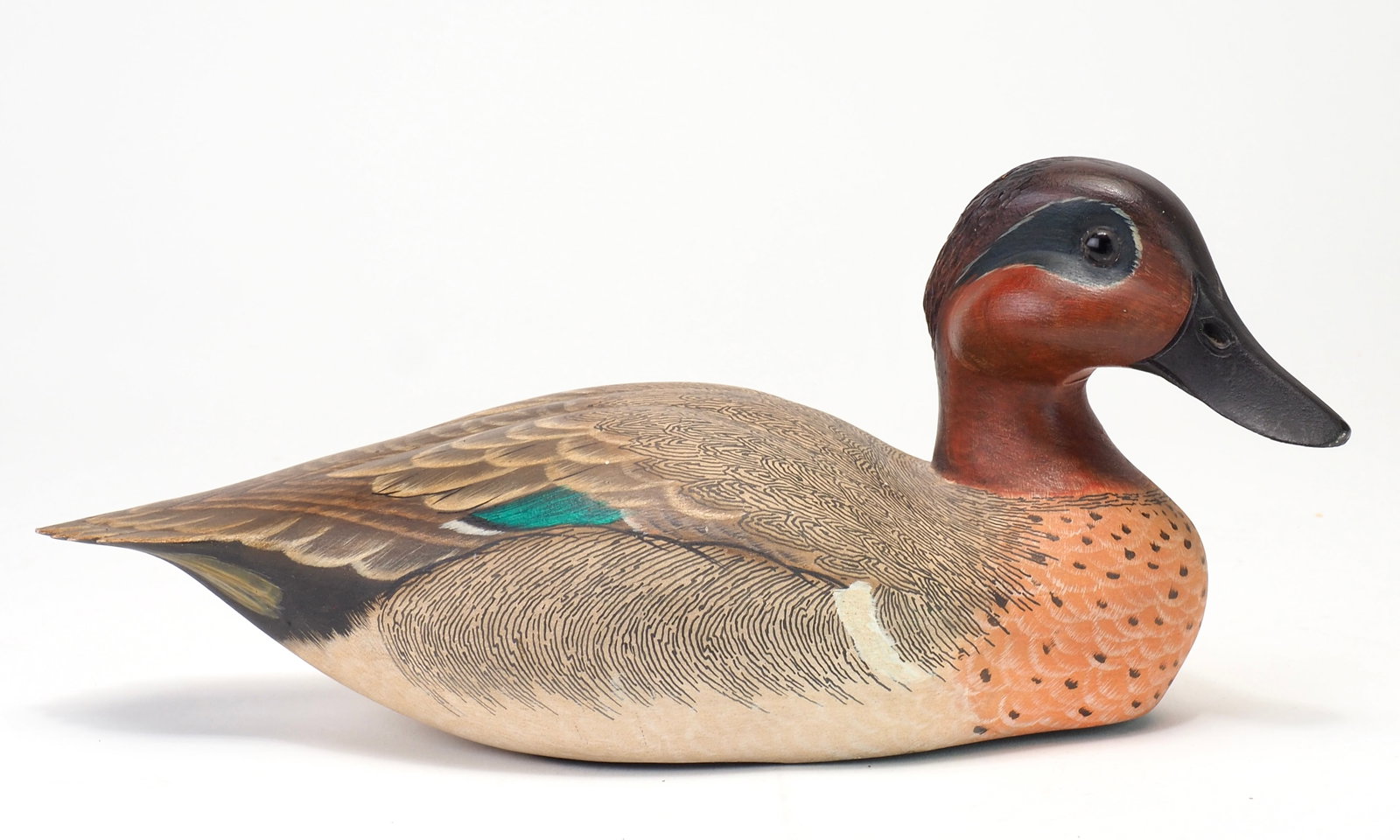 Ken Harris - Green-winged Teal Drake: Ken Harris (1905-1981) Woodville, NY c.1978 11" long Heavily rasped head with carved bill details and glass eyes. Carved tail feathers. Specially signed and inscribed by Ken Harris on the underside.