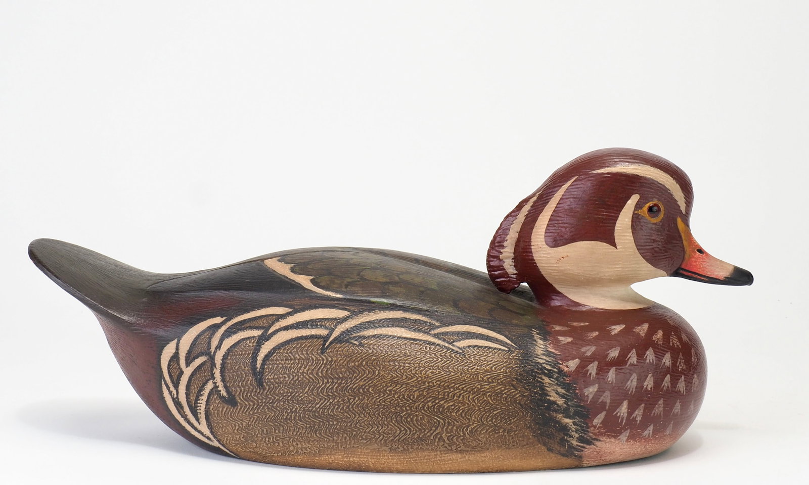 Ken Anger - Wood Duck Drake: Ken Anger (1904-1983) Dunnville, Ontario, Canada 13" long Anger was a highly regarded commercial decoy carver whose work became a defining part of the Dunnville carving tradition. An avid hunter and f