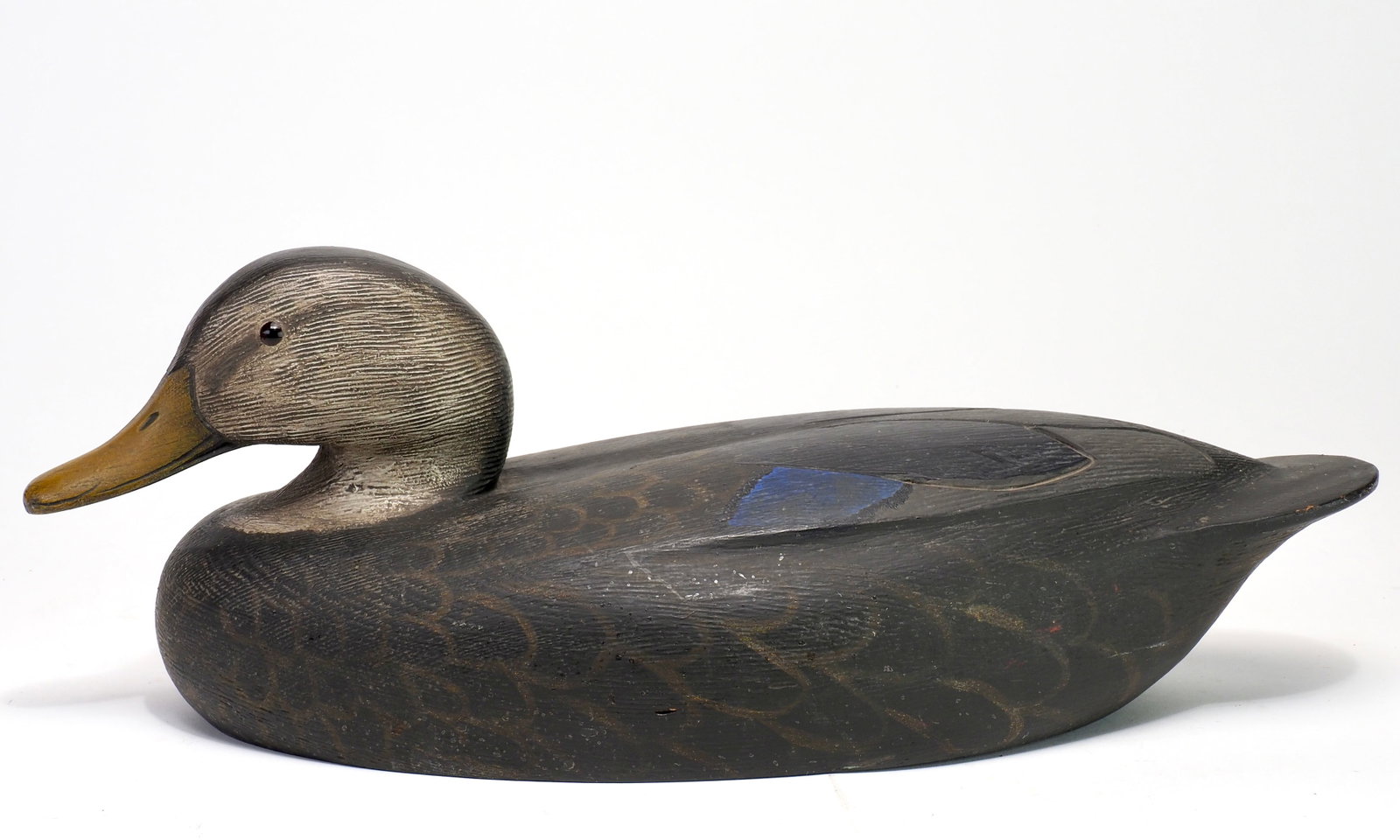 Ken Anger - Excellent Black Duck: Ken Anger (1904-1983) Dunnville, Ontario, Canada 16.25" long Anger was a highly regarded commercial decoy carver whose work became a defining part of the Dunnville carving tradition. An avid hunter