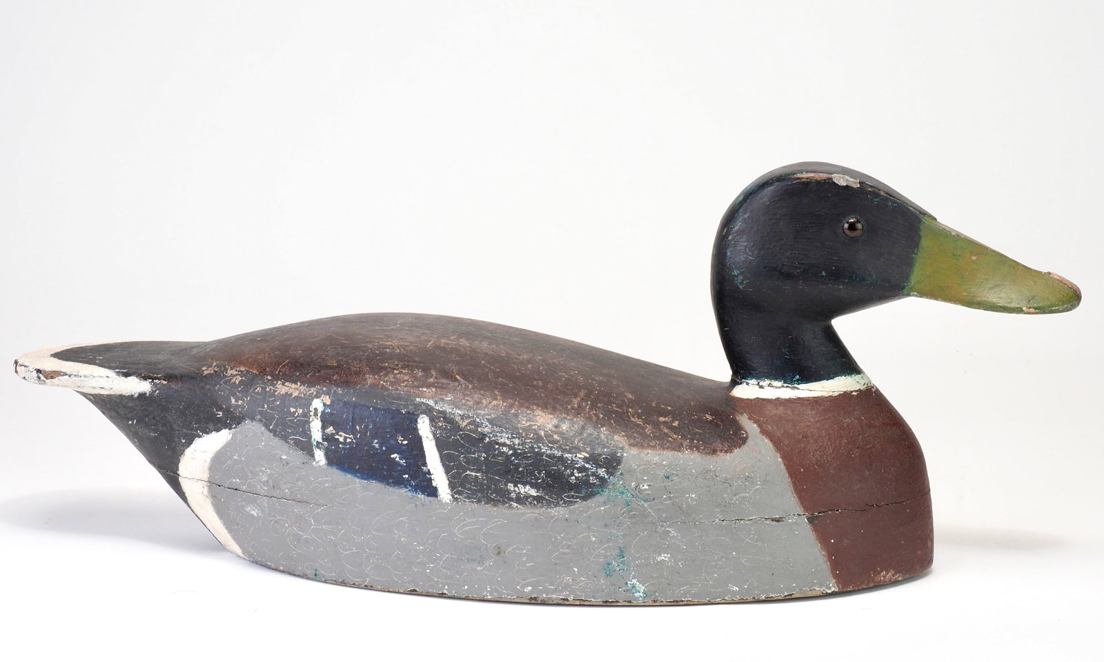 Ferman Eyre - Mallard Drake: Ferman Eyre (1882-1969) Brockville, Ontario, Canada 17.25" long Historically mallards were not plentiful bounty on the St. Lawrence river and so there are very few period mallards. This decoy likely