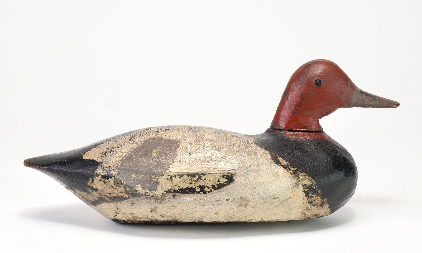 William H. Garner - Redhead Drake: William H. Garner (1869-1937) Sandusky, OH c.1900-1915 12" long William H. Garner was said to have carved decoys for local hunters and some for use at Winous Point Shooting Club and Ottawa Shooting