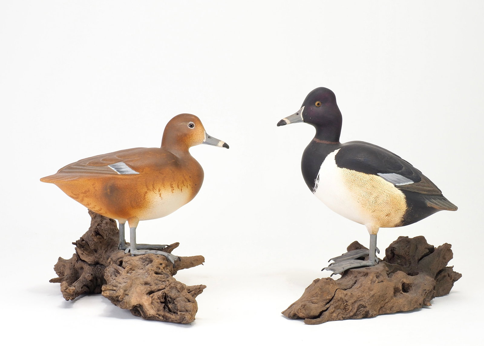 John Sharon - 1/3 Ringbill Pair: John Sharon (1921-1998) Toledo, OH c.1960's Drake 7" tall on scene | Hen 6.25" tall on scene Sharon was a respected regional decoy carver whose work is particularly collected in the miniature-carving