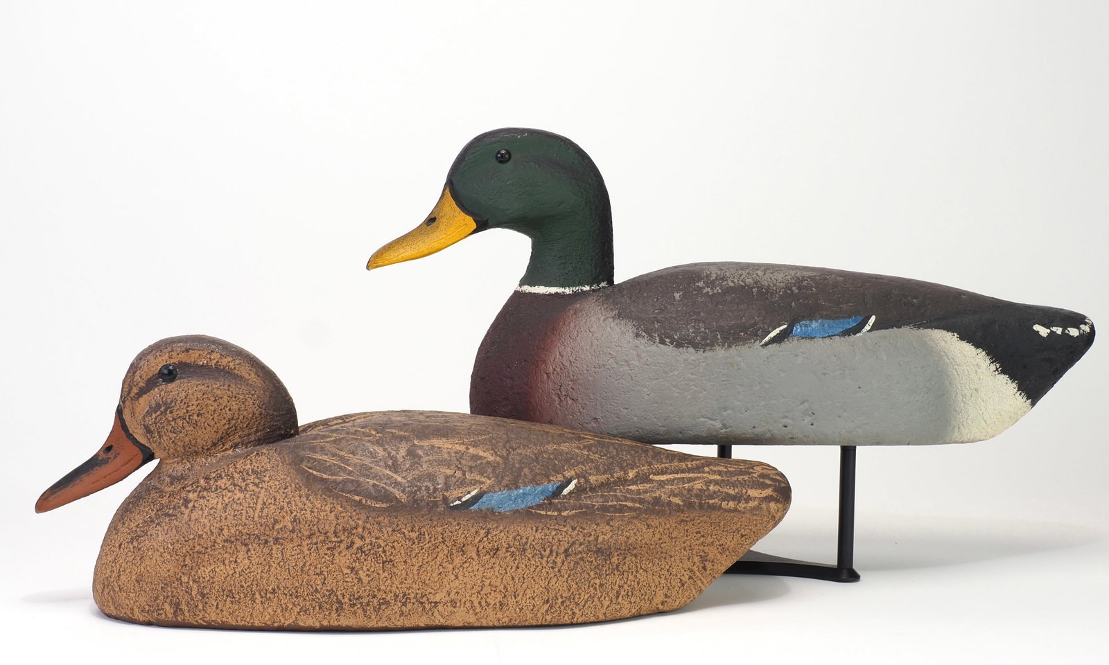 Bill Enright - Personal Collection Mallard Pair: Bill Enright (1913-1979) Toledo, OH c.1940-45 Drake 17.5" | Hen 16.5" The pair is from Bill Enrights personal collection, having spent their time in his home over his fireplace. Cork bodies with