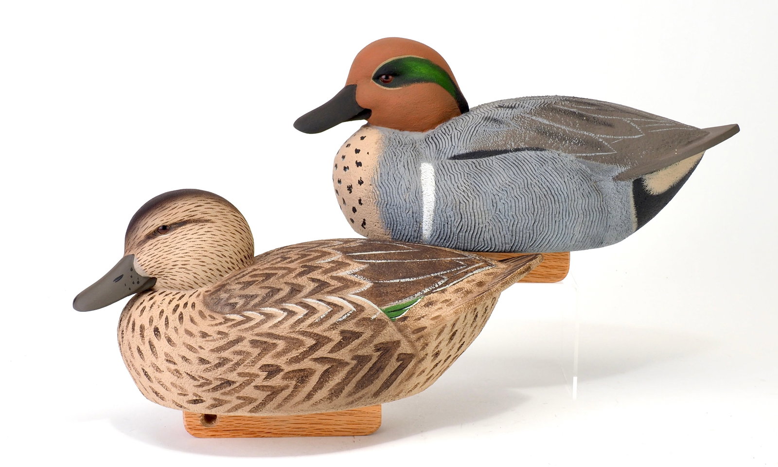 Mark Costilow - Greenwing Teal Pair: Mark Costilow (b.1963) Amherst, OH, 2007 11" long Costilow is a highly accomplished competition decoy carver whose work grew from a lifelong connection to waterfowling and the Lake Erie region. As a