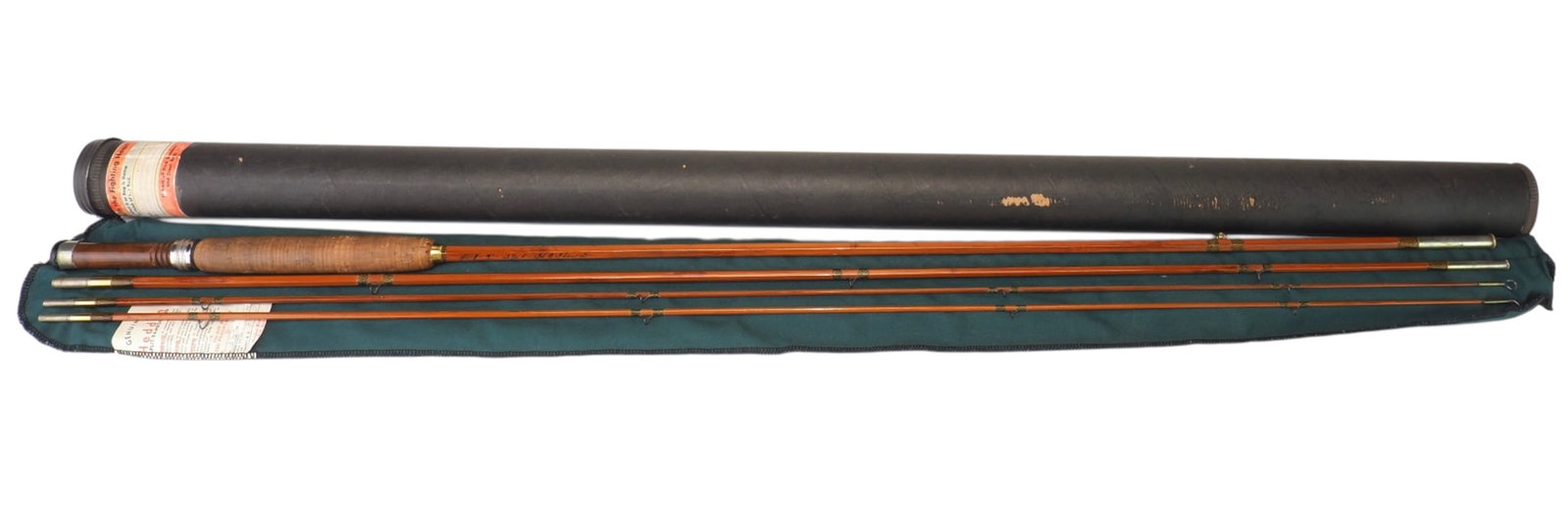 Heddon Model 8 Fly Rod: James Heddon & Sons Dowagiac, Michigan 9 feet Split bamboo Heddon Model #8. Comes with original rod sleeve and paper rod tube, 3/2, 9 foot #40 Condition: Good and original with light wear from use