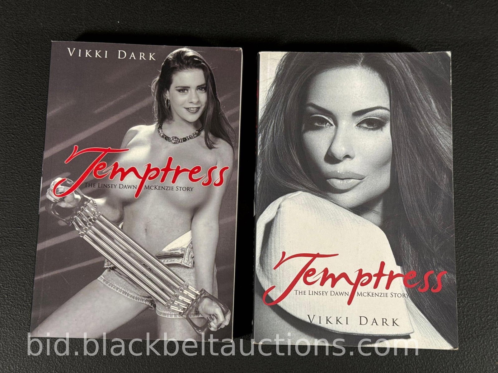 Two “Temptress” Books by Vikki Dark: Two “Temptress” paperback books by Vikki Dark 2015. These books are biographies of Linsey Dawn McKenzie. Minor wear to the covers