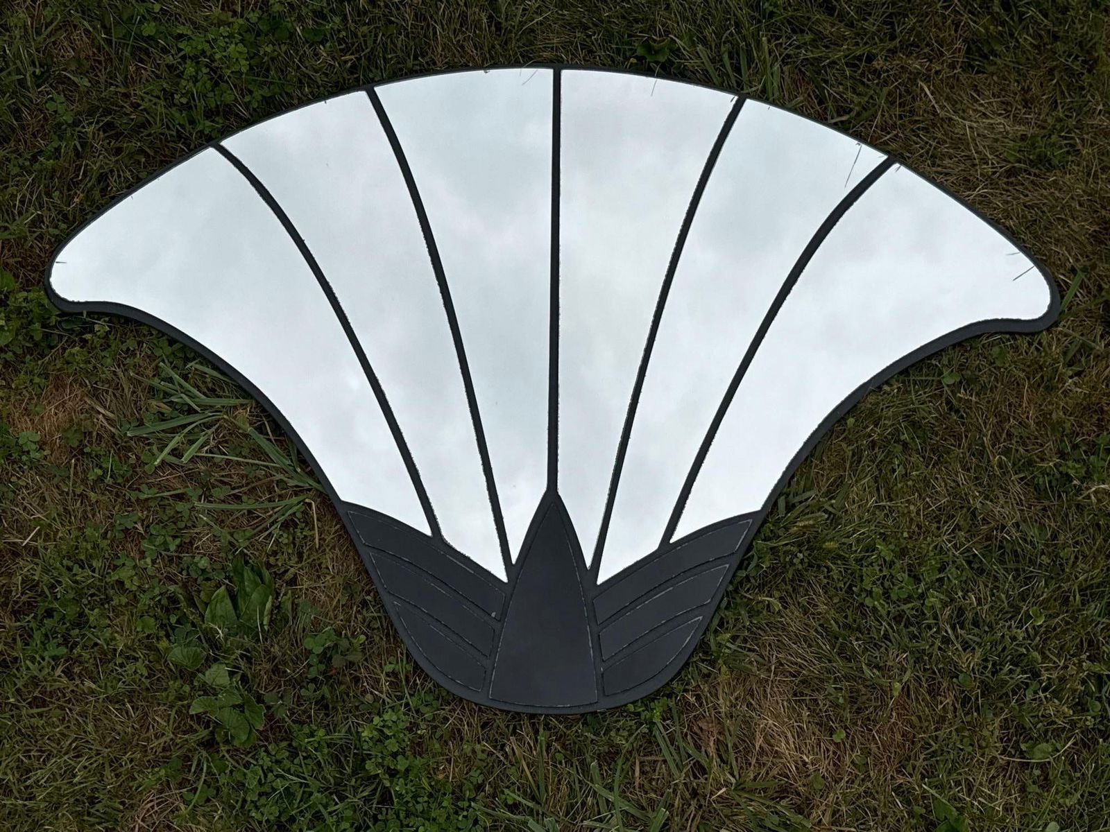 David Marshall Mirror: A decorative mirror by David Marshall with floral or more specifically a tulip design (24”H, 36.25”W)