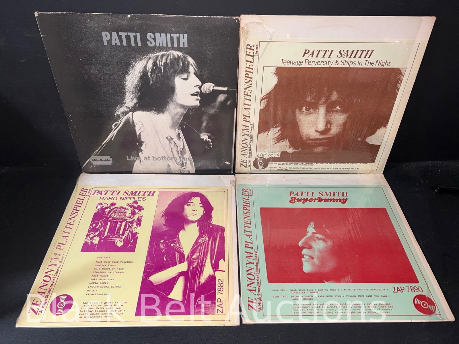 Four Vintage Vinyl Patti Smith Live Albums: Lot description: Four vintage vinyl Patti Smith live albums to include: ”Live at Bottom Line” from a 1975 broadcasting recording at The Bottom Line in New York, pressed in Germany by Free