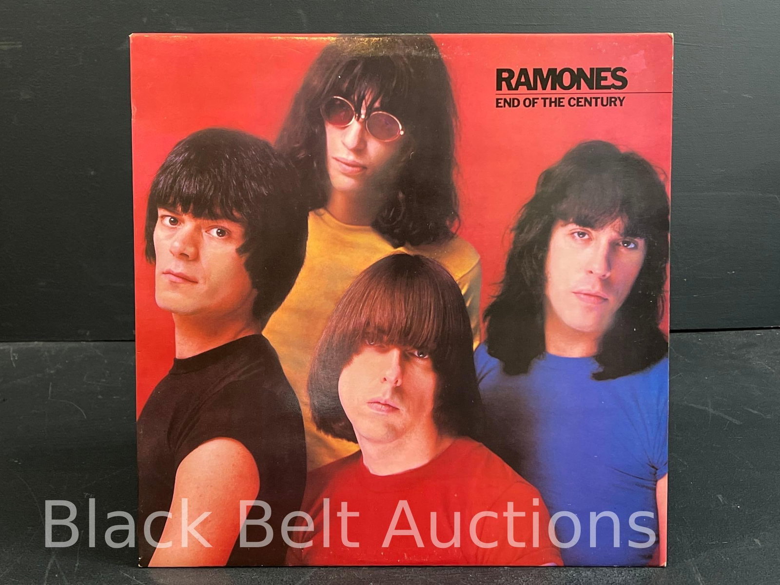Ramones “End of the Century” Vinyl lp: Lot description: Ramones “End of the Century” vinyl lp on Sire Records catalog no. SBK 6077. Comes with lyric inner sleeve. Vinyl has light scuffs and grades EX. Cover has a mark left by a
