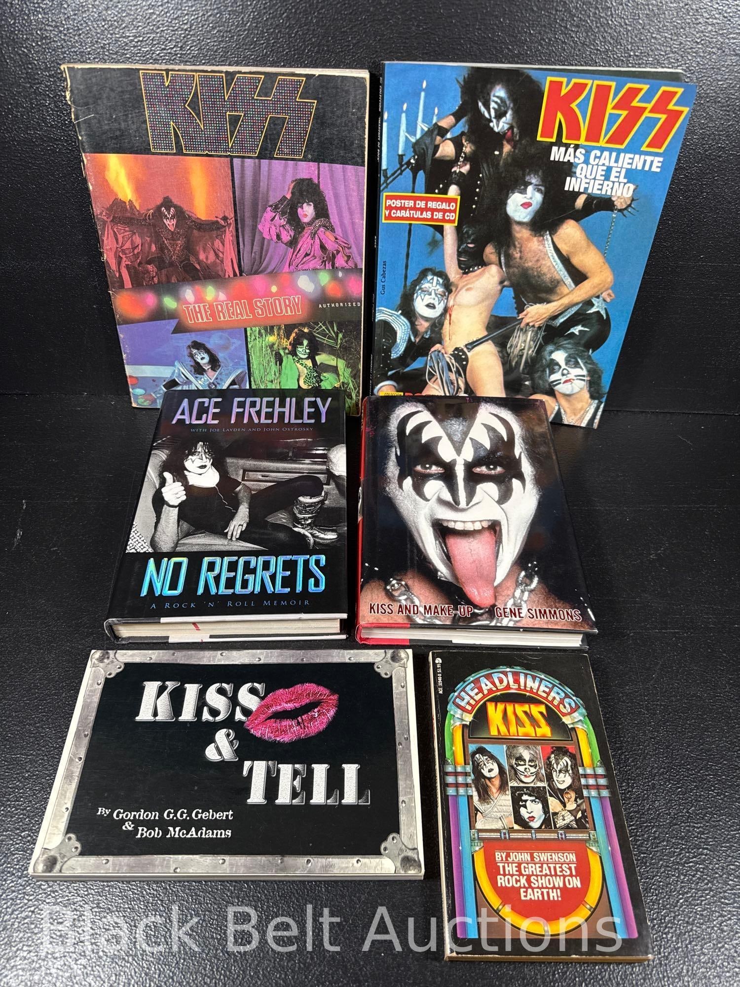6 KISS Books: Lot description: A grouping of 6 KISS related books/magazines to include: A 1980 printing of "KISS: The Real Story Authorized" by Peggy Tomarkin (Books shows age/ware); A KISS Rock magazine in sp