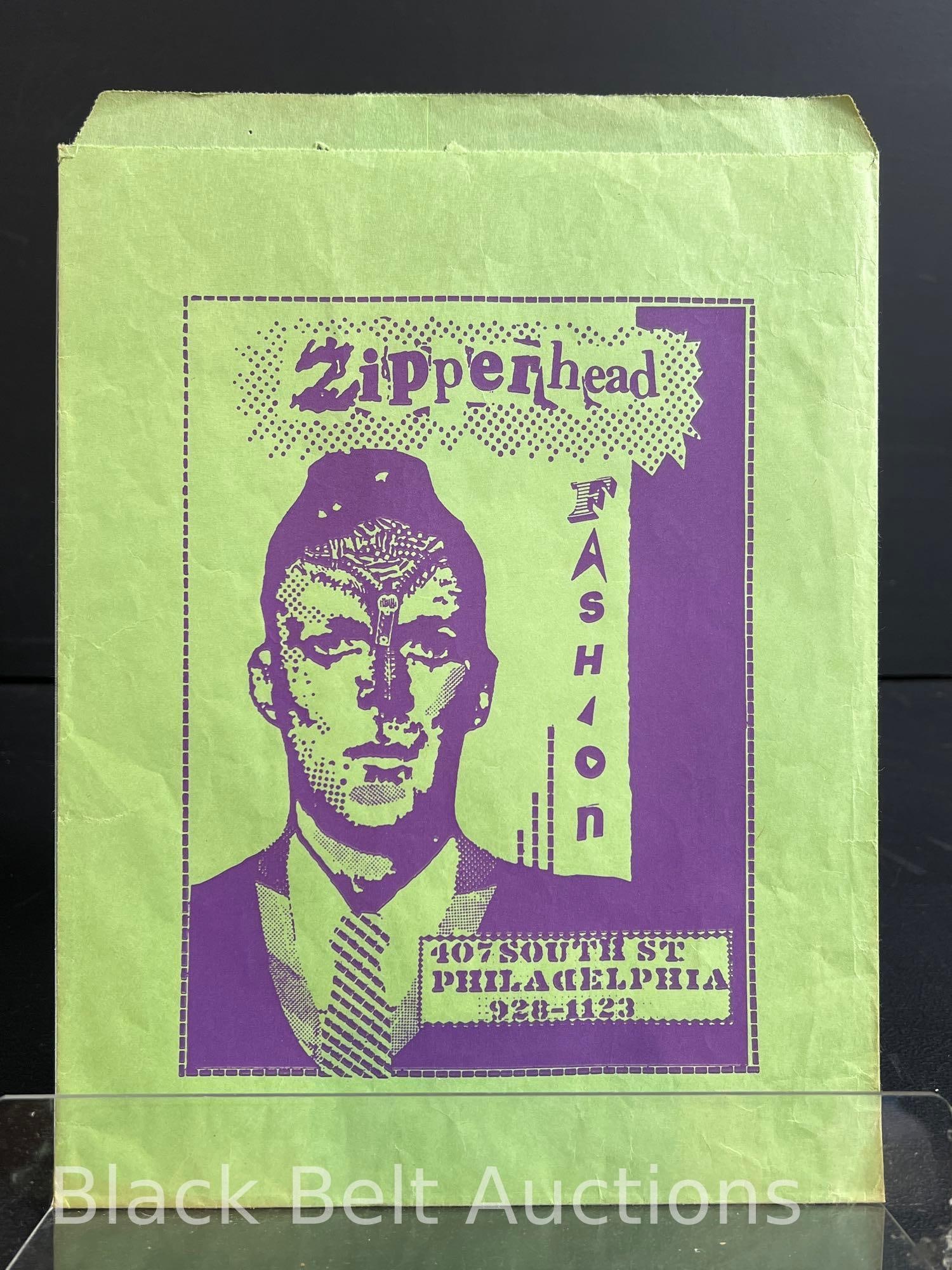 Vintage Zipperhead Shopping Bag: Lot description: Vintage 1980s 11 1/2 x 8 1/2 inch paper bag from the ultimate punk clothing store on South Street in Philadelphia: Zipperhead! The bag looks like it’s been handled then flattene
