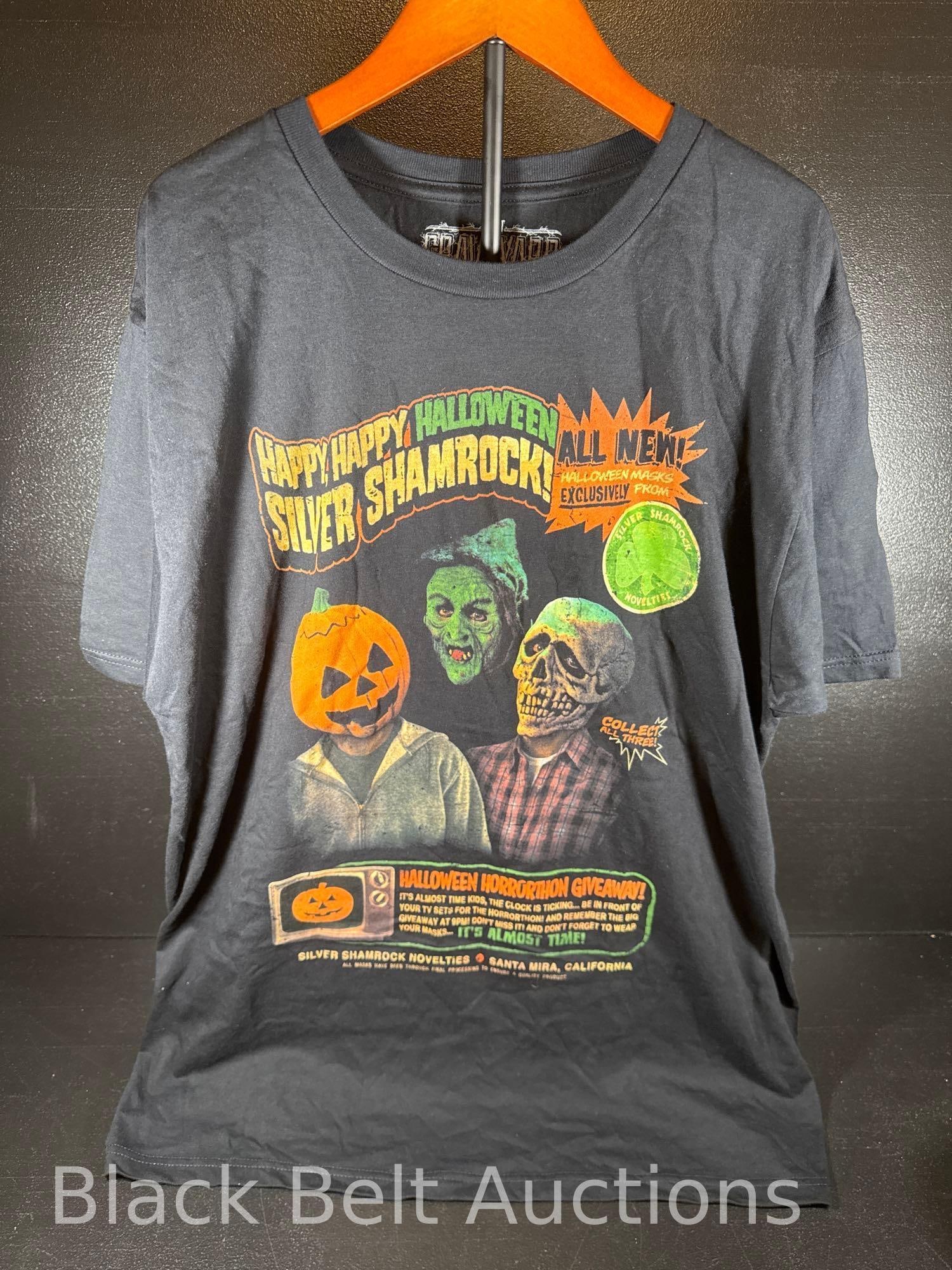 Halloween Silver Shamrock T-Shirt: Lot description: A Freight Rags Graveyard X-Large: Bring These Shirts Back to Life "Happy, Happy Halloween Silver Shamrock" Novelties T-Shirt promoting Halloween masks. Inside printing of the 