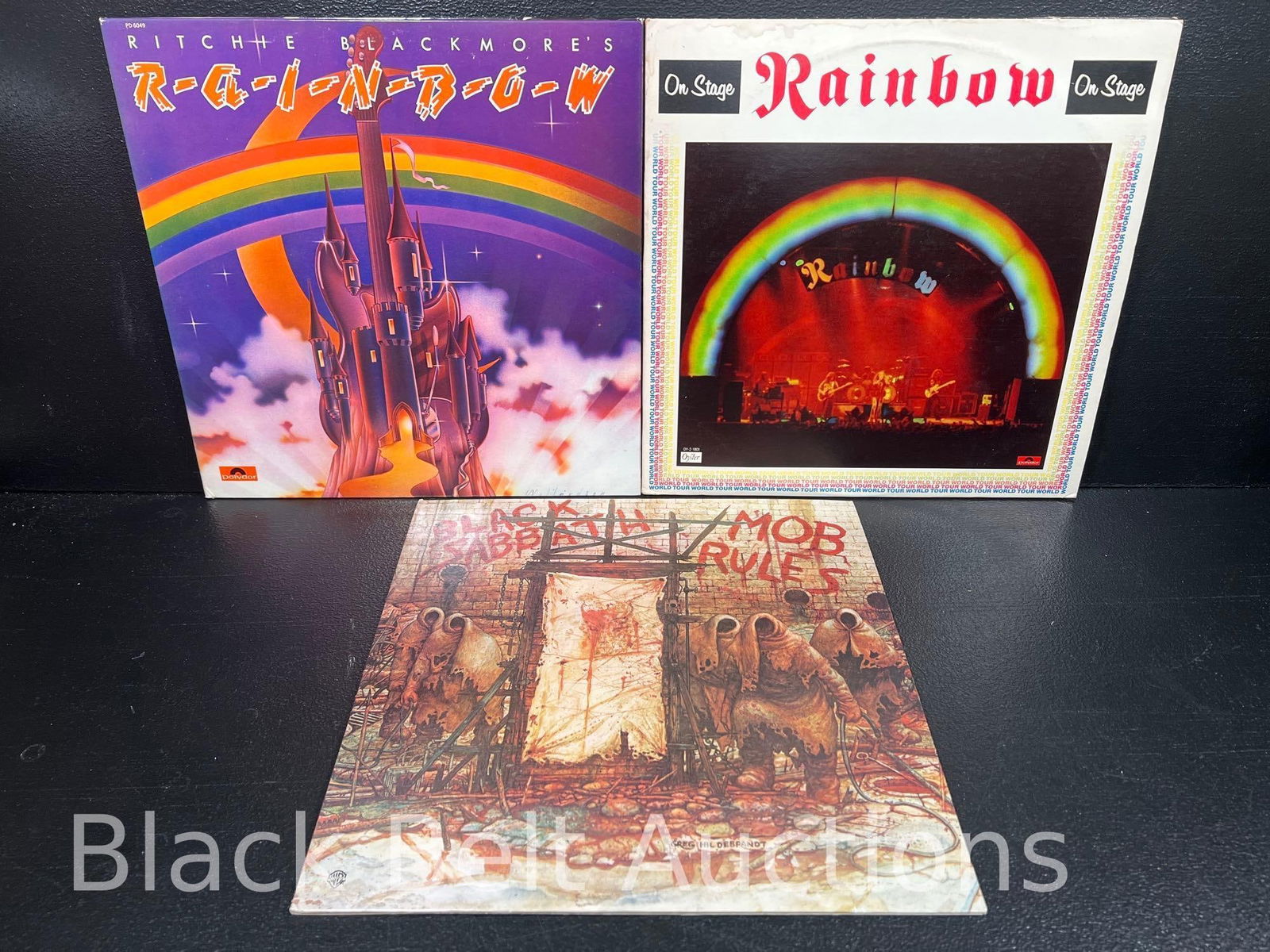 Three Vintage Ronnie James Dio Vinyl Records: Lot description: Three vintage vinyl Los from bands whose lead singer was Ronnie James Dio to include: "Ritchie Blackmore’s Rainbow" a 1975 US pressing on the Polydor label catalog no. PD 6049.