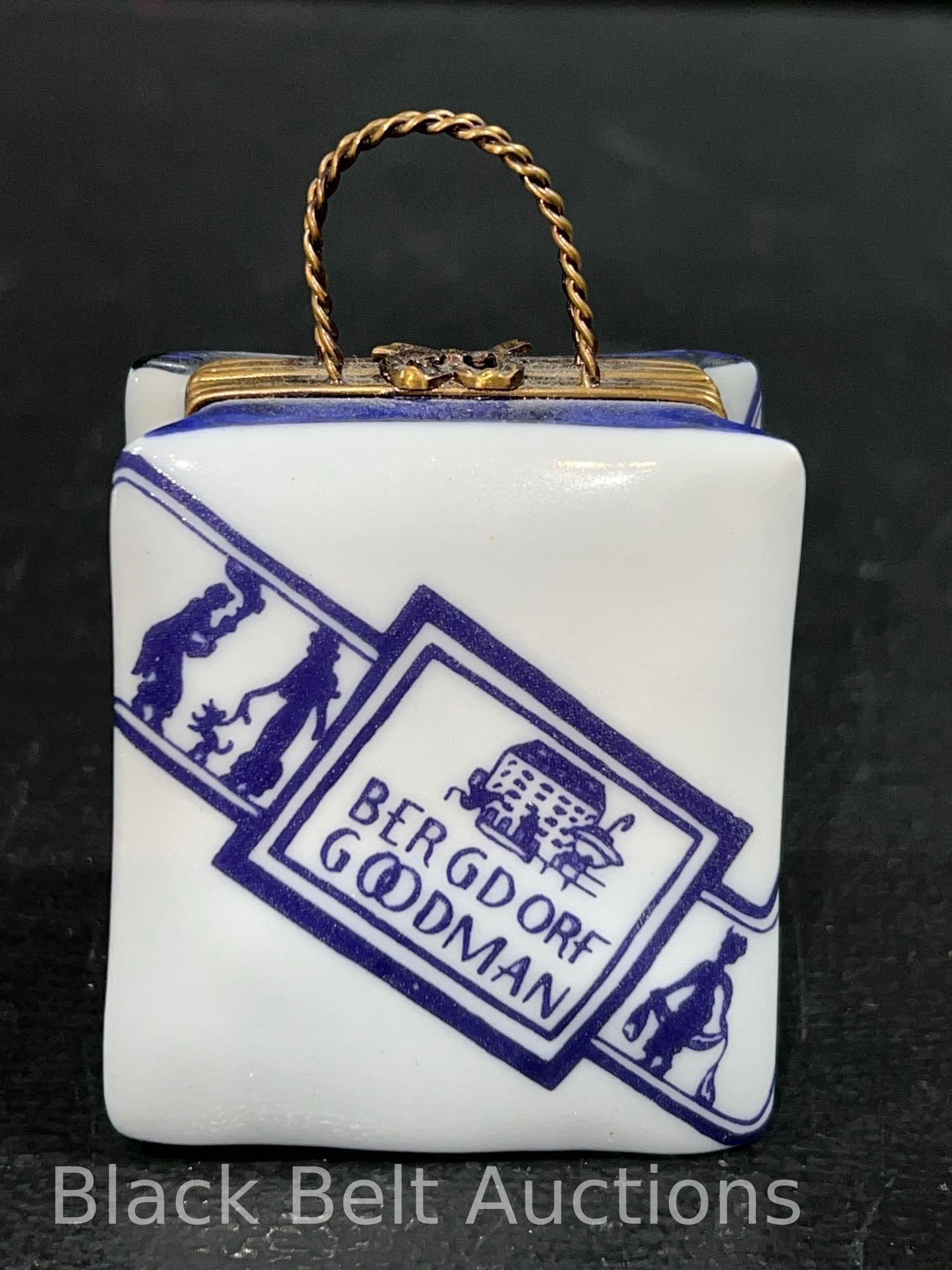 Limoges "Bergdorf Goodman" Trinket Box: Lot description: Vintage hand painted porcelain Limoges "Bergdorf Goodman" shopping bag trinket box. 2 3/4 inches high, 1 3/4 inches long and 1 1/4 inches deep. Catch is a little loose, no chips, crac
