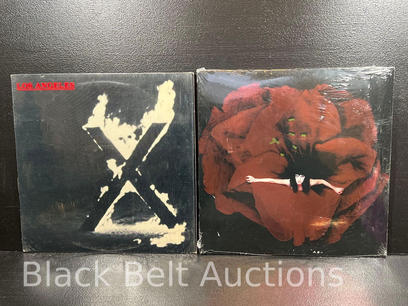 X "Los Angeles" and Smashing Pumpkins "Adore": Lot description: Ultimate Punk vs. Grunge lot to include: X "Los Angeles" - a 1980 US pressing on Slash Records catalog no. SR-104. The original shrink wrap is still covering the jacket, the jacket ha