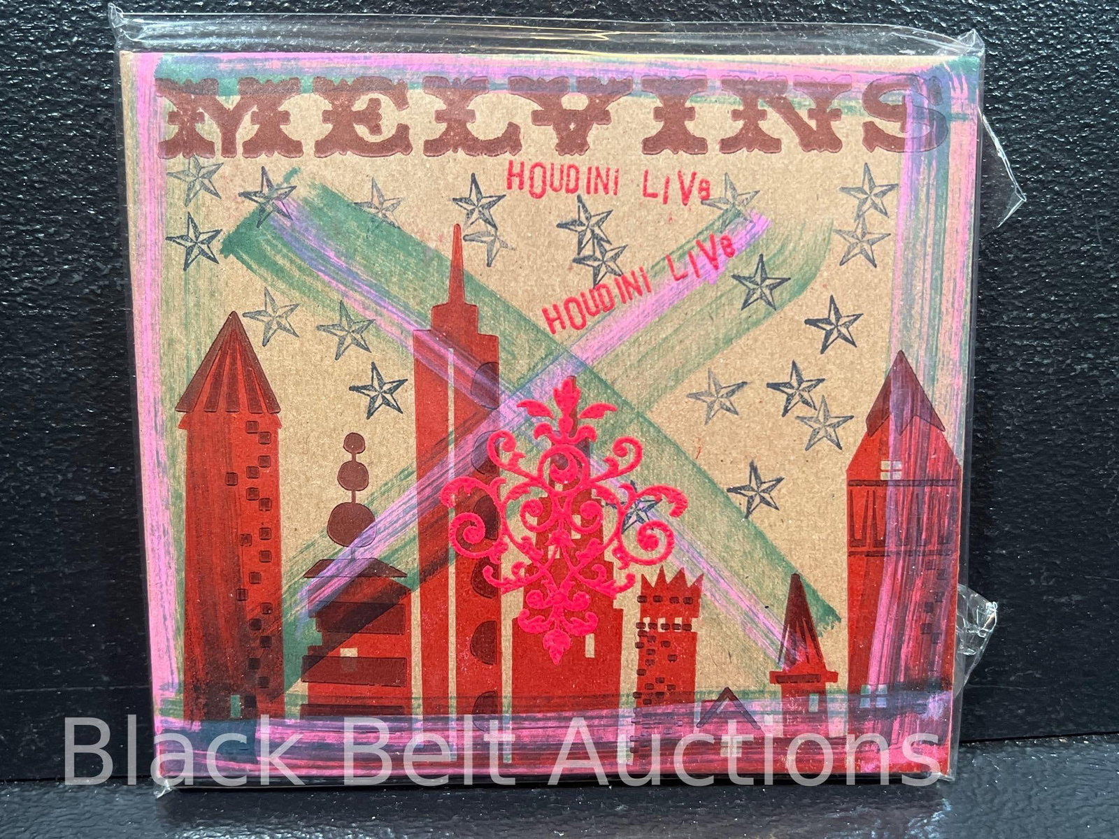 Melvins "Houdini Live" CD Mackie Art Edition: Lot description: The Melvins "Houdini Live" - a 2022 US pressing on Ipecac Recordings catalog no. IPC-76. The cover art was done by Mackie Osborne and includes a red wax seal showing a bee most