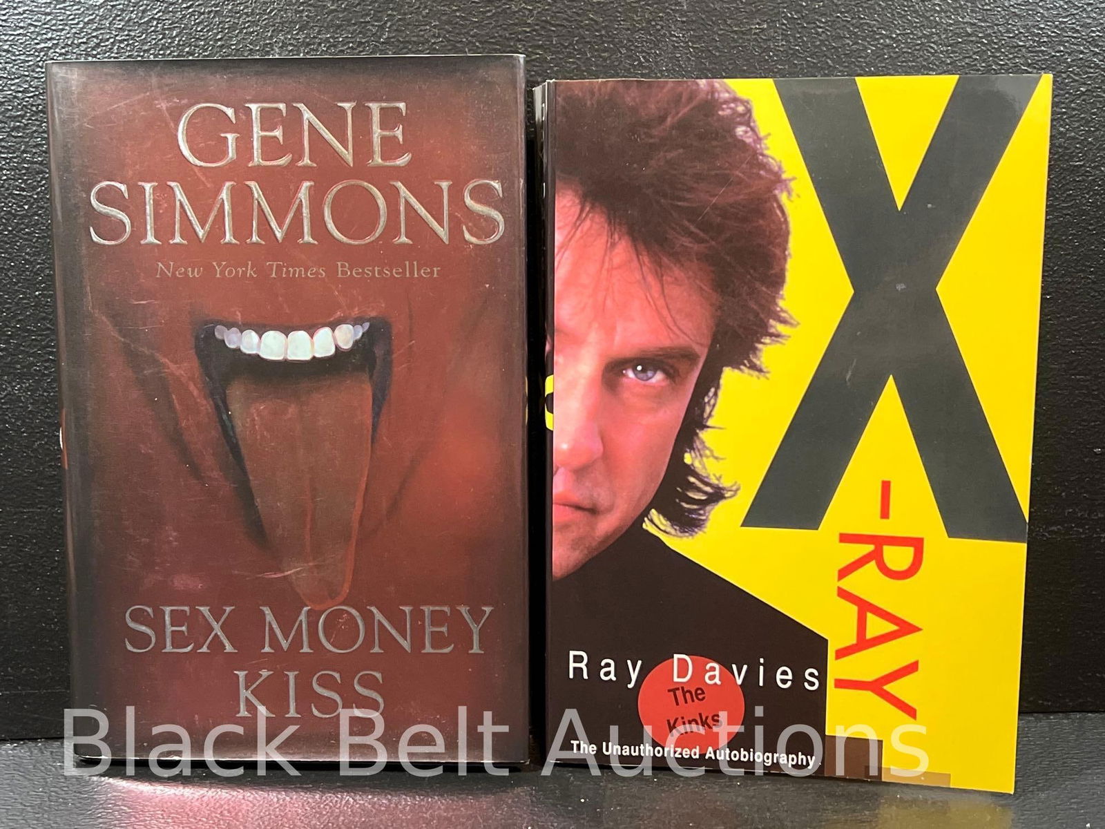 Two Books Signed By Their Authors: Lot description: Two books signed by their Rock and Roll authors to include: ”Sex, Money and KISS” by Gene Simmons (of KISS) second edition, maroon dust jacket. Hardback book published in