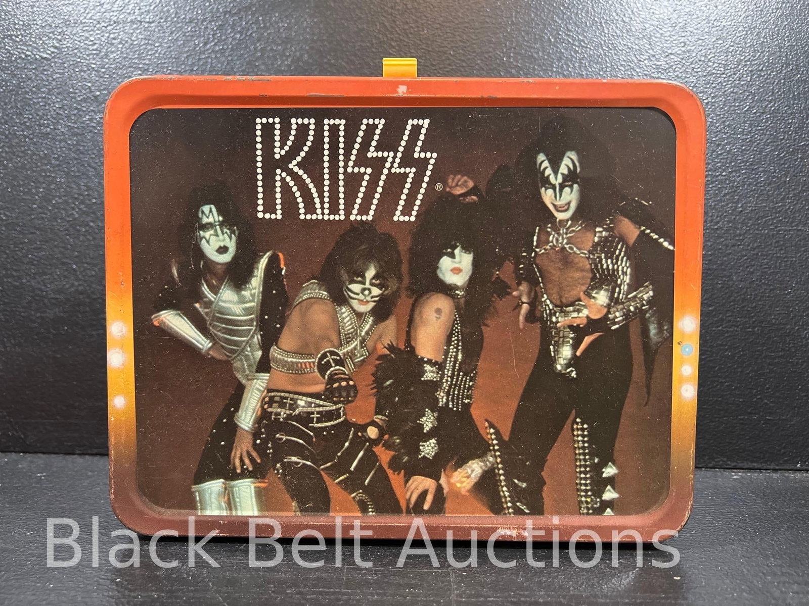 Original 1977 KISS Lunchbox and Bottle: Lot description: Vintage 1977 King-Seeley Thermos brand KISS lunch box and the original Thermos bottle. The lunchbox shows some wear on the raised edges and corners. On the front and back panels there