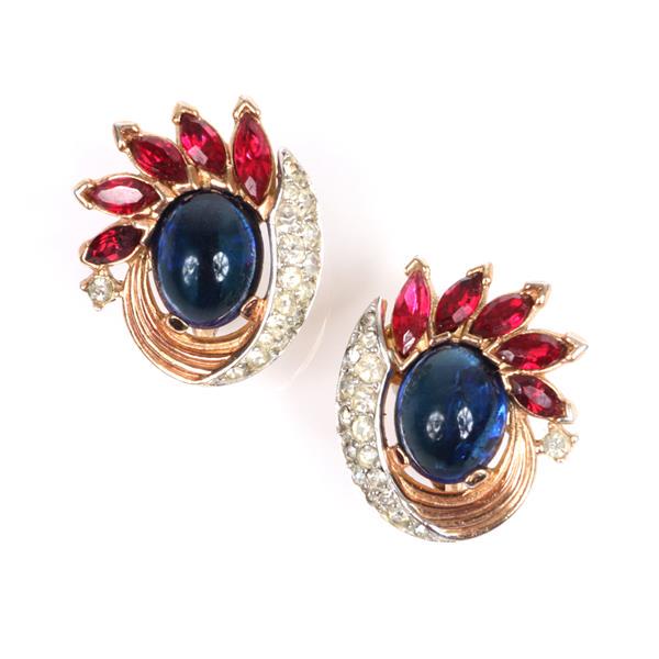 Trifari Mogul 'Jewels of India' earrings with sapphire: Trifari Mogul 'Jewels of India' earrings with sapphire blue glass cabochons ruby red marquise crystals gold wash and pave details.