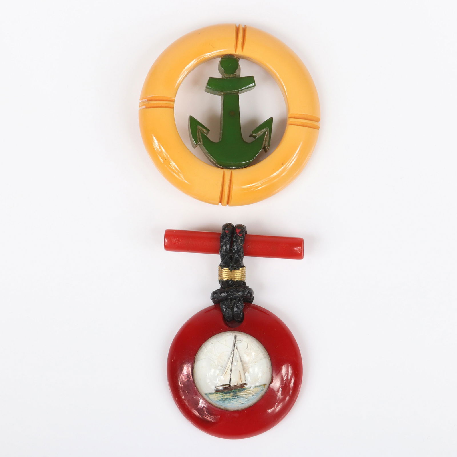 Two Bakelite nautical pins: red bar pin with reverse (1 of 4)