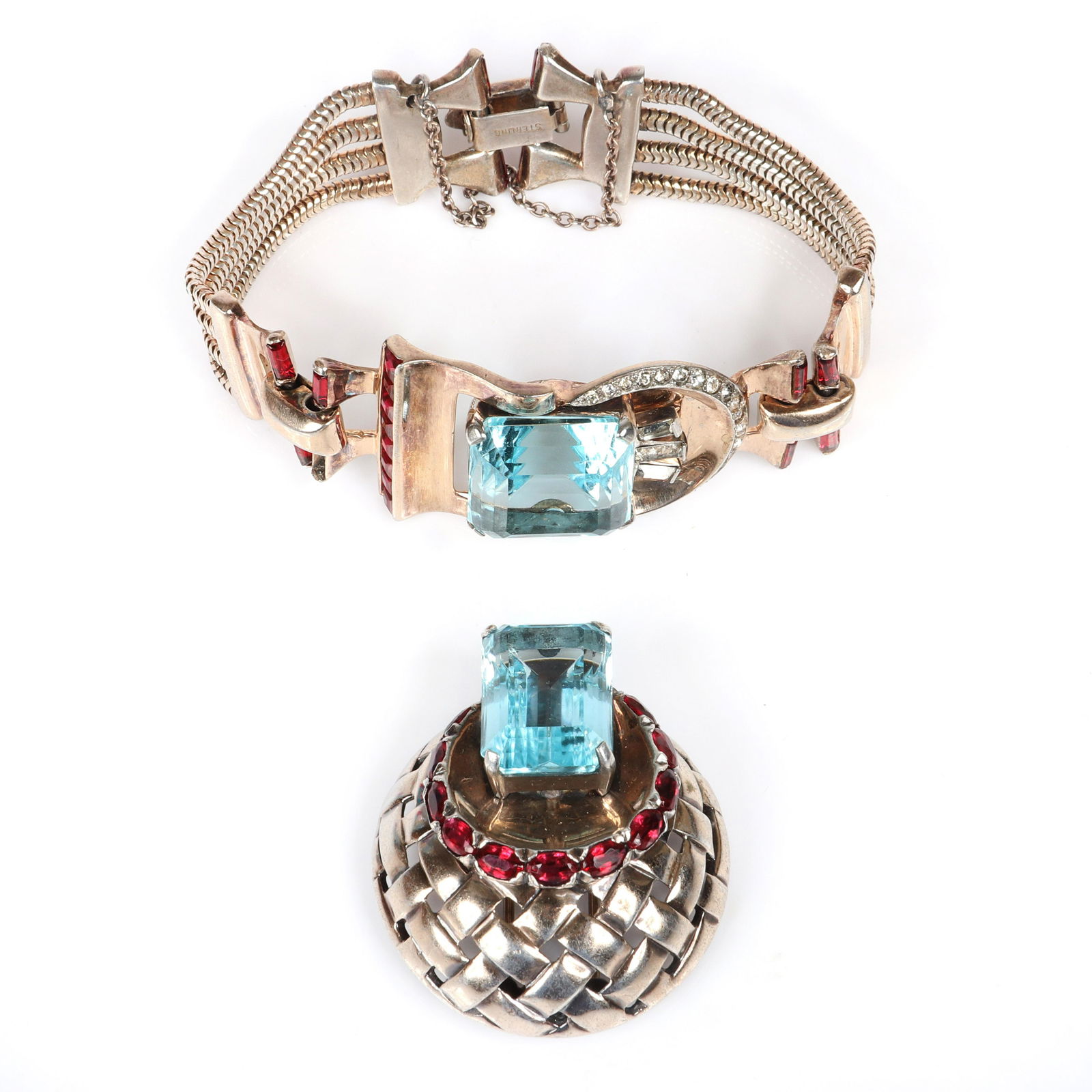 Mazer Retro sterling vermeil round lattice clip with: Mazer Retro sterling vermeil round lattice clip with ruby oval rhinestones and huge faceted aqua emerald-cut crystal, with unsigned Mazer? sterling chain bracelet with large aqua crystal. 7"L (bracele