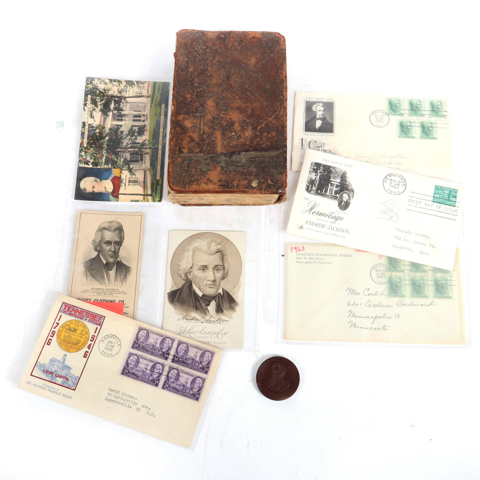 Andrew Jackson 8pc memorabilia: 1883 book Biography of: Andrew Jackson 8pc memorabilia: 1883 book Biography of Andrew Jackson, rubber Union Coffee Co, NY Jackson Token, 4 first day issue stamps, Hermitage post card, 2 advertising cards., Biography of Andre