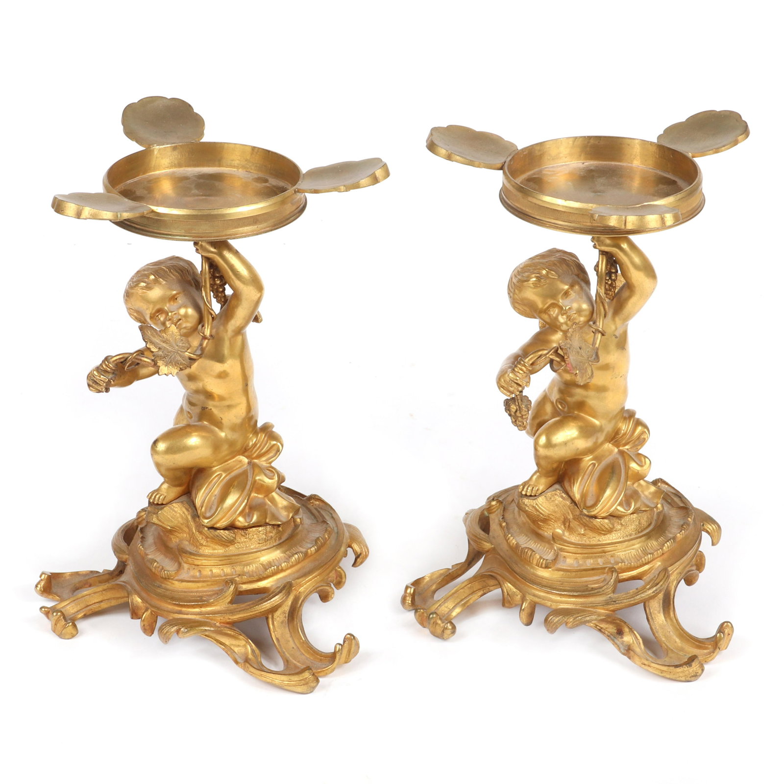 Pair of French Rococo Revival gilt bronze dore and: Pair of French Rococo Revival gilt bronze dore and ormolu figural compote bases with cherub holding grape vine supporting cut crystal bowls, c. 1870s-1880s., One bowl original., 11"H x 8"W