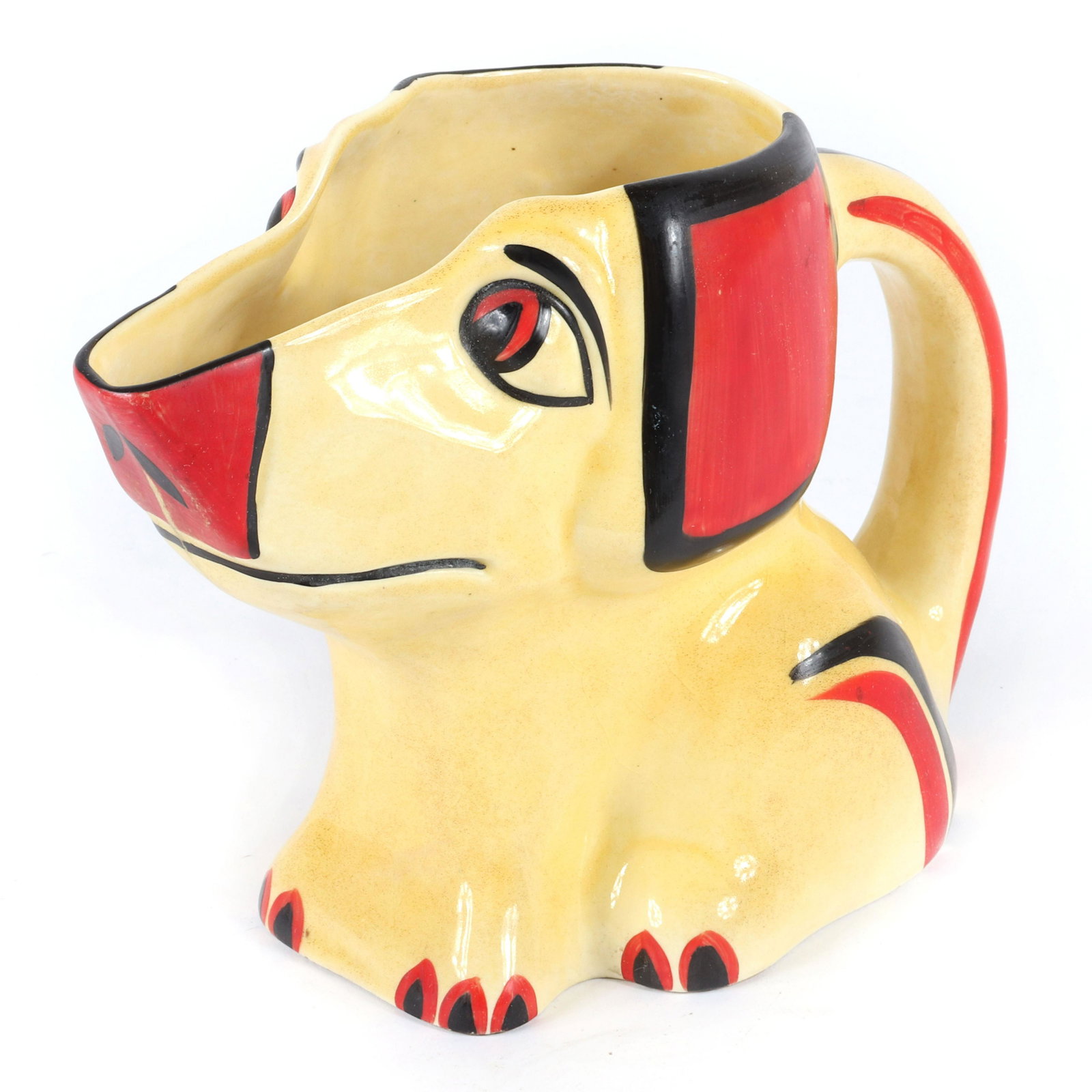Erphila Czech Art Deco ceramic dog pitcher.: Erphila Czech Art Deco ceramic dog pitcher. Czechoslovakian figural pitcher with polychrome decoration of yellow, black and red. 6"H x 8"W x 4"D