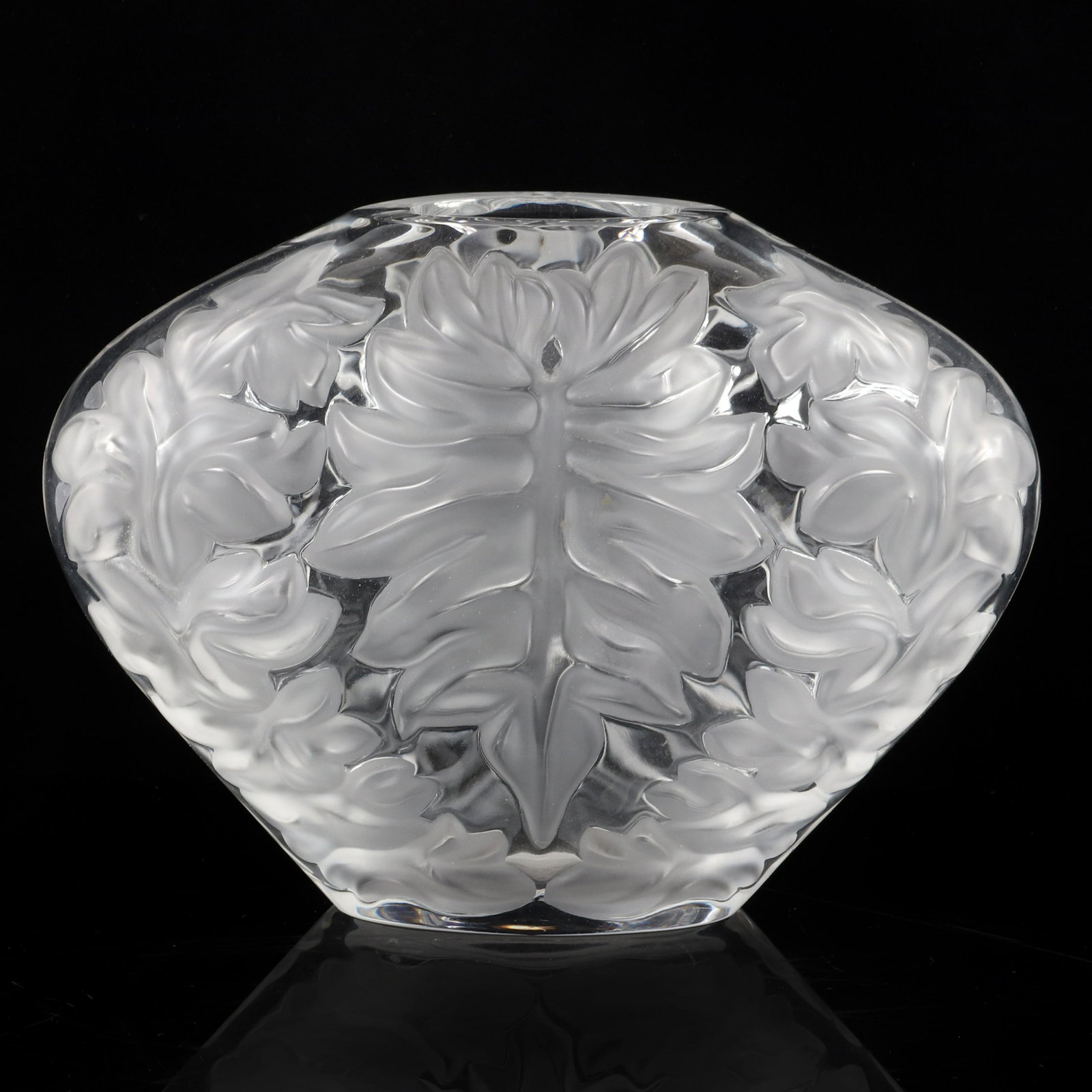 Marie-Claude Lalique France 1993 limited edition art: Marie-Claude Lalique France 1993 limited edition art glass pillow vase with embossed frosted foliate motif. Engraved under base. 6"H