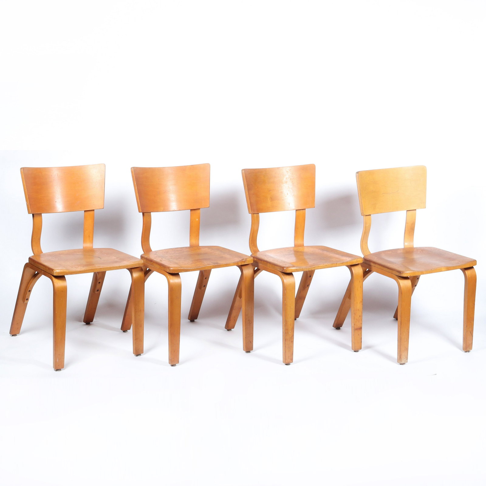 Four Thonet New York Mid Century bentwood chairs,: Four Thonet New York Mid Century bentwood chairs, signed on under seat. Wear as shown. 33 1/4"H x 17 1/2"W x 23"D