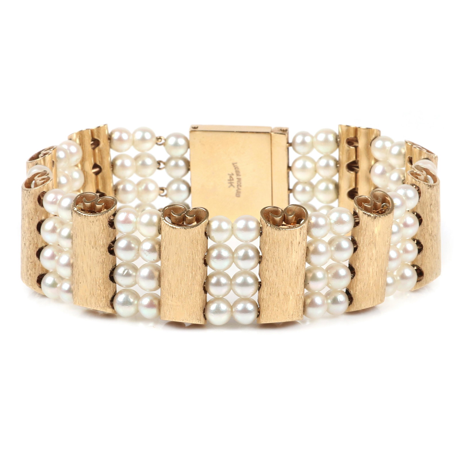 Lucien Piccard vintage couture designer stamped 14K: Lucien Piccard vintage couture designer stamped 14K yellow gold and pearl bracelet in box with original tag. Contains four rows of 4.5mm pearls and textured gold scroll spacers. 7 1/2"L, 22.00 dwt.