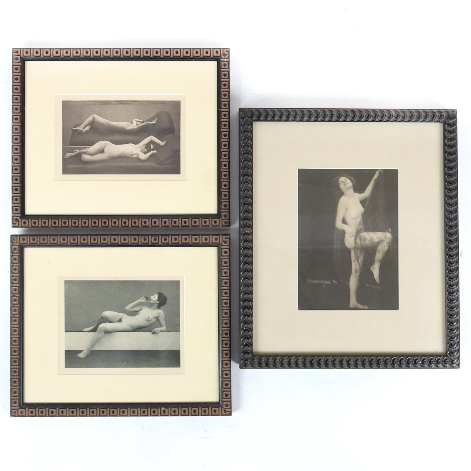 Three vintage risque female nude photogravure prints,: Three vintage risque female nude photogravure prints, pair with reclining masked figures, and one standing figure ca. early 20th Century in matching frames. Likely Max Koch German (1859-1930) and Otto