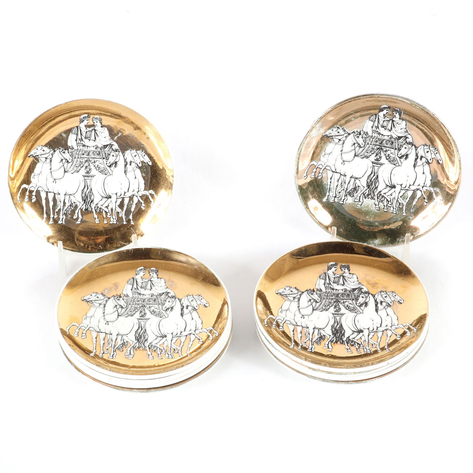Ten Piero Fornasetti Milano gilt coasters with a (1 of 5)