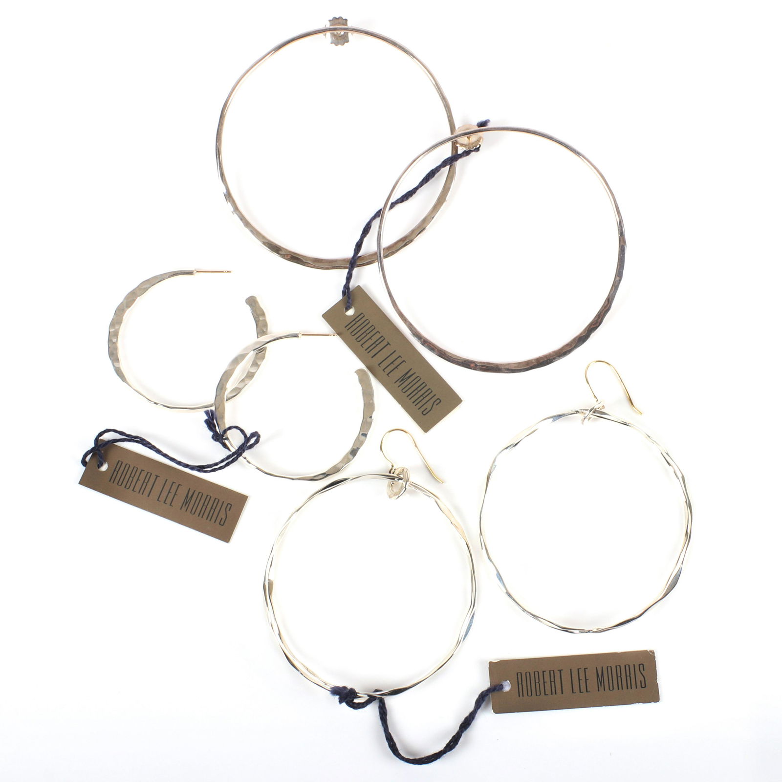 Robert Lee Morris RLM three pr. hoop earrings: large: Robert Lee Morris RLM three pr. hoop earrings: large forward facing 3"diam. hoops, hammered double crossover, hammered hoops with 14K gold hooks/posts, marked RLM 925, new old stock with original tags