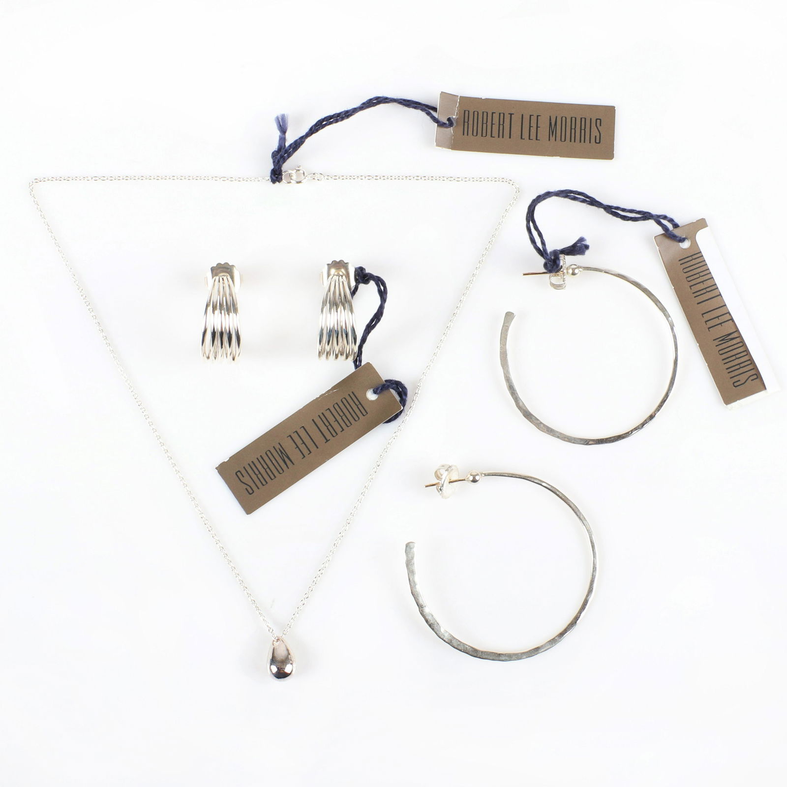 Robert Lee Morris RLM 3pc sterling silver designer: Robert Lee Morris RLM 3pc sterling silver designer group: cable chain necklace with teardrop pendant with and 2pr hoop earrings with 14K gold posts, marked RLM 925, new old stock with original tags. R