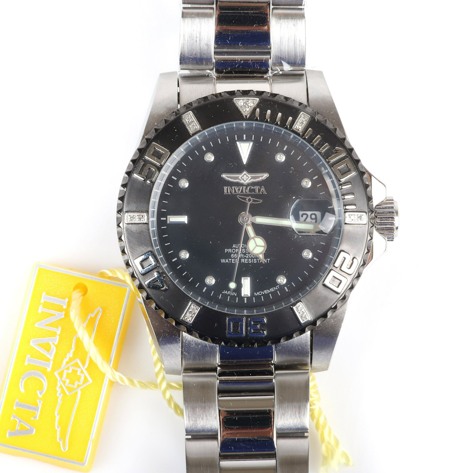 Invicta gentlemen's 4847 Pro Diver Collection silver: Invicta gentlemen's 4847 Pro Diver Collection silver automatic watch with black-plated unidirectional rotating bezel with 23 hand set diamond-accented elapsed time markings. Never worn, with original