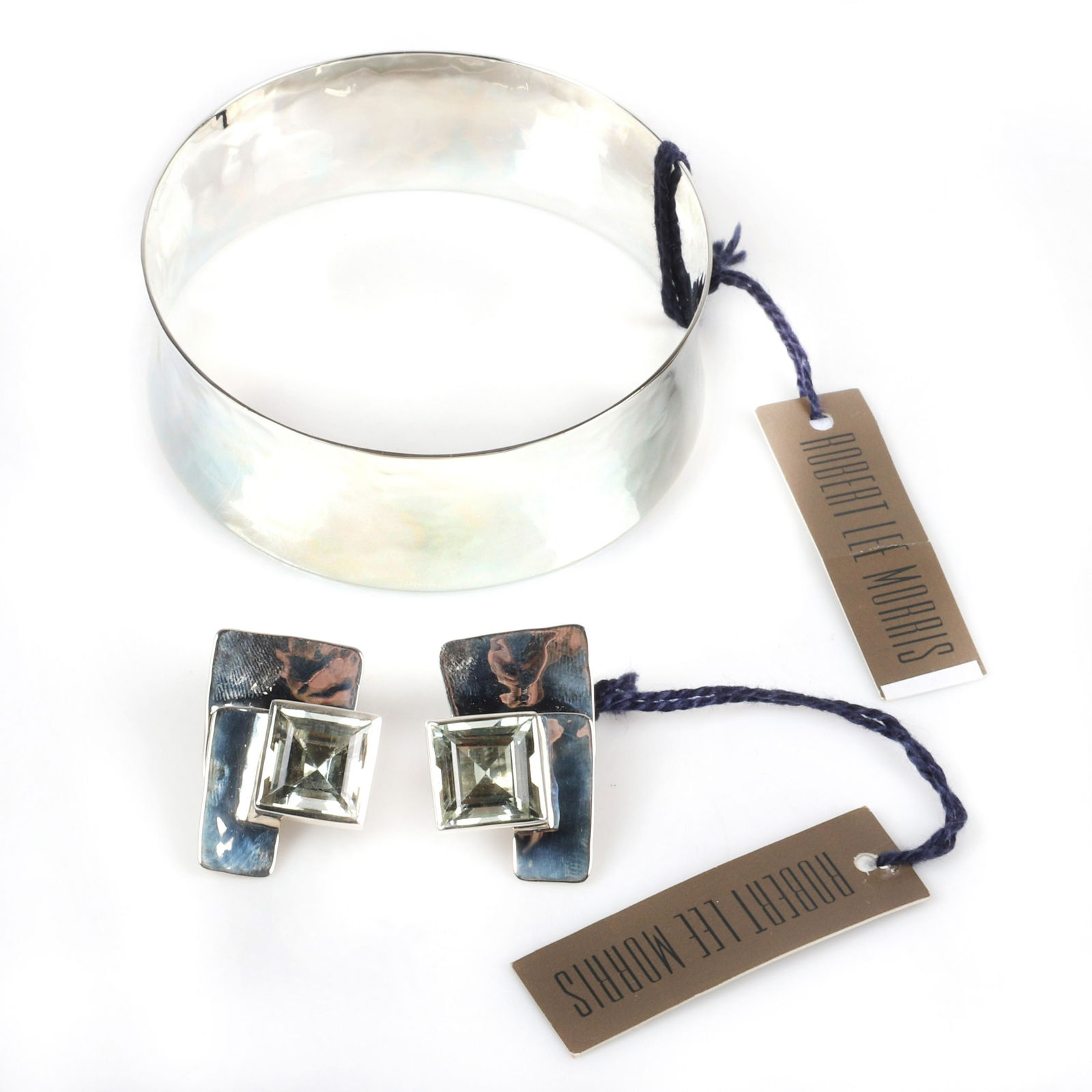 Robert Lee Morris RLM designer sterling silver hand: Robert Lee Morris RLM designer sterling silver hand hammered convex bracelet & earrings with hand hammered layered geometric panels and large 1/2"H pale blue faceted semi precious stone, 14K gold post