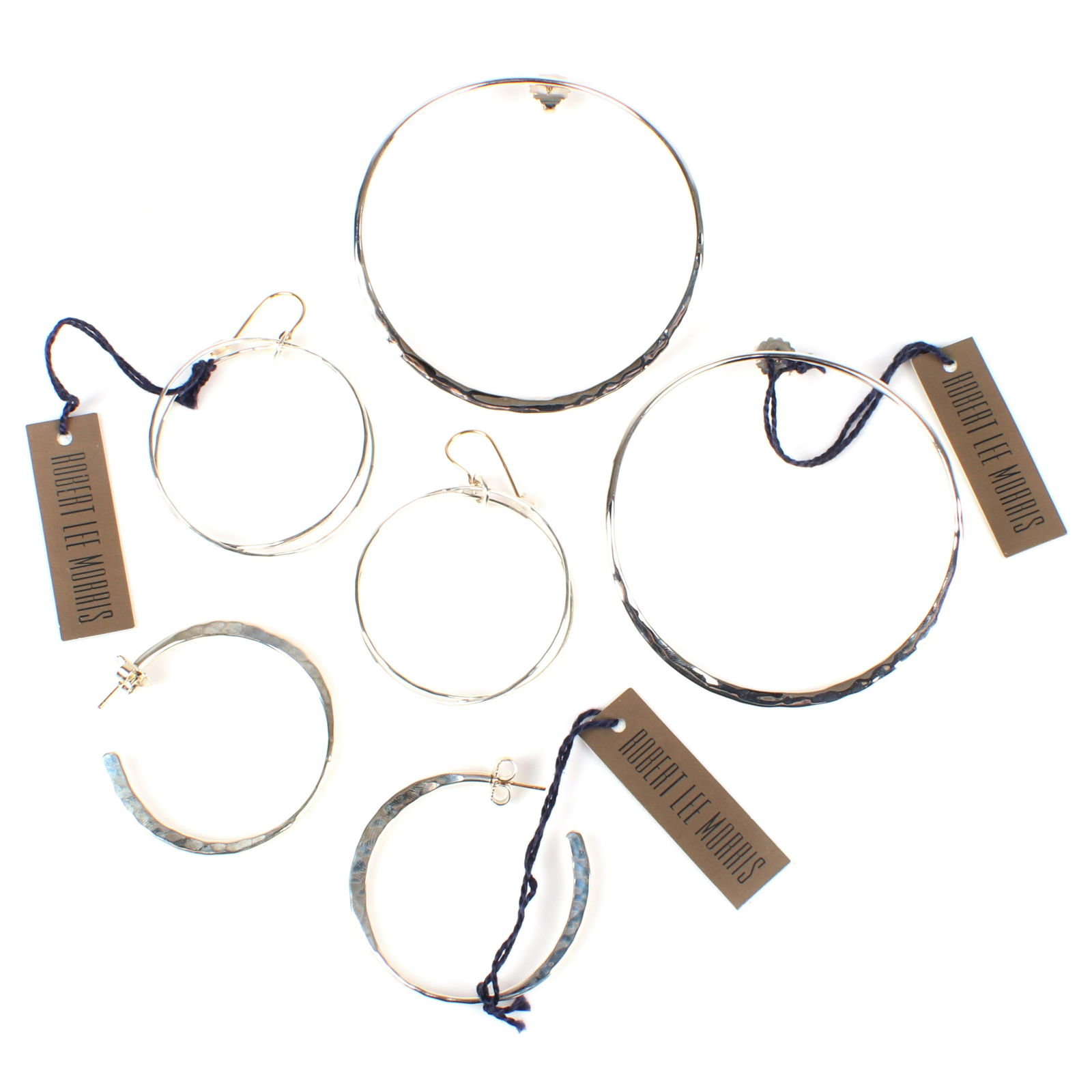 Three pairs of Robert Lee Morris RLM sterling silver: Three pairs of Robert Lee Morris RLM sterling silver hoop earrings with 14K gold hooks including huge hammered 3" hoops, hammered medium hoops, medium double crossover hoops, new old stock with origin