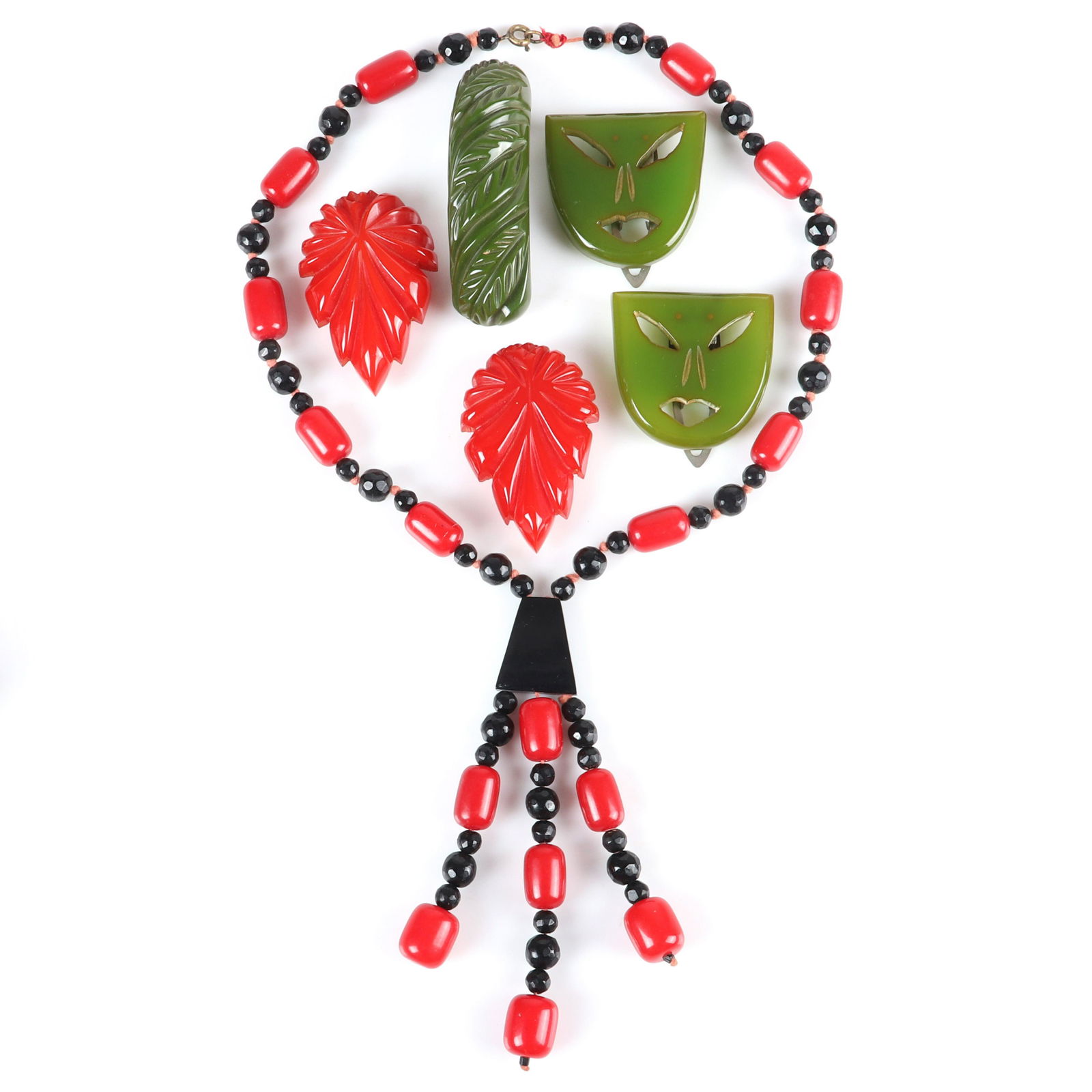 Vintage 6pc: 5 red & green Bakelite carved clips and (1 of 5)