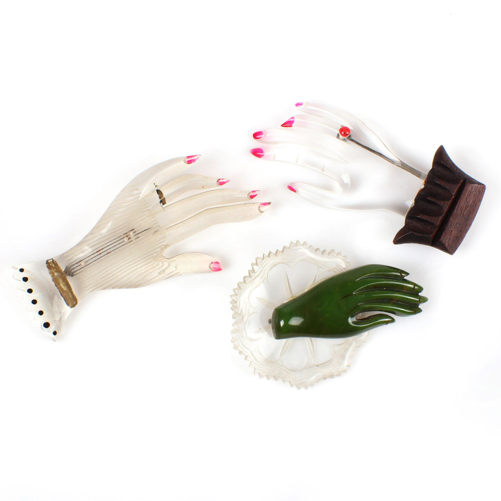 Three carved Bakelite, lucite and wood glamour hand (1 of 4)