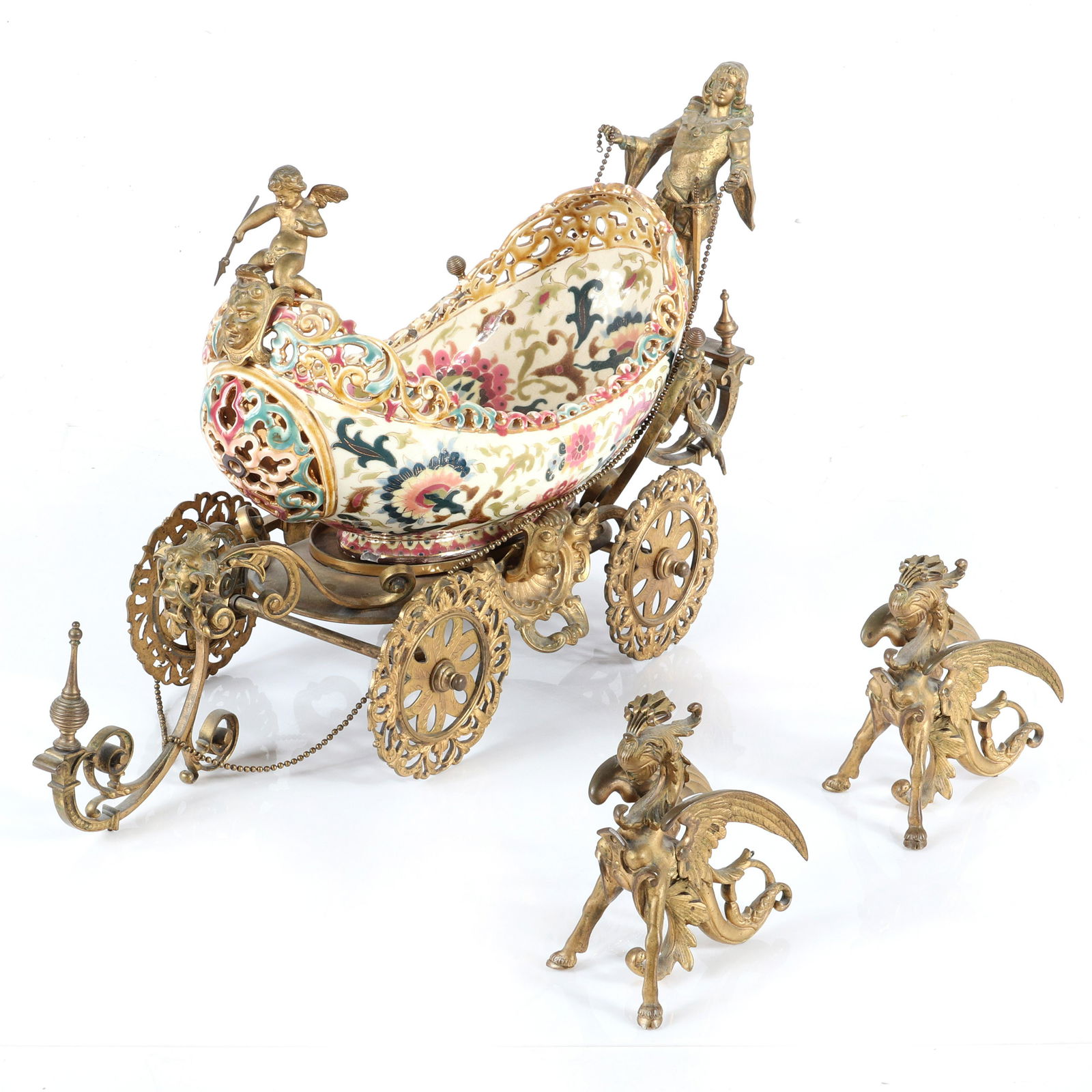 Zsolnay Hungarian porcelain 19th century centerpiece: Zsolnay Hungarian porcelain 19th century centerpiece boat form bowl with gilt bronze figures mythical beasts and carriage mounts. The gondola form bowl in cream ground with pierced and scrolled border