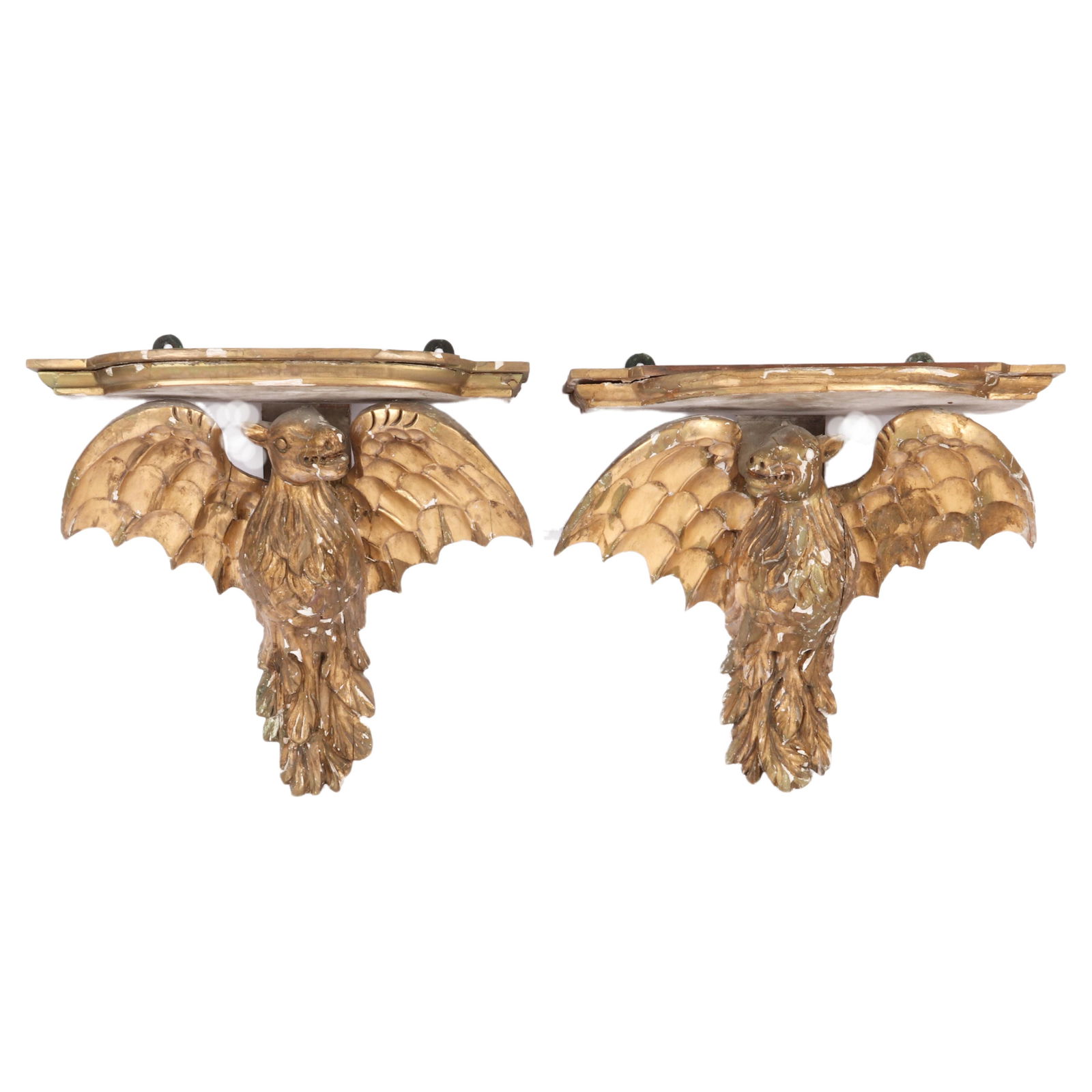 Pair Continental Italian? carved and gilt figural Bat /: Pair Continental Italian? carved and gilt figural Bat / Griffin / Mythical Beast shelf sconces. Loss to gilt throughout. Normal age wear with various tight splits and one missing section of shelf that