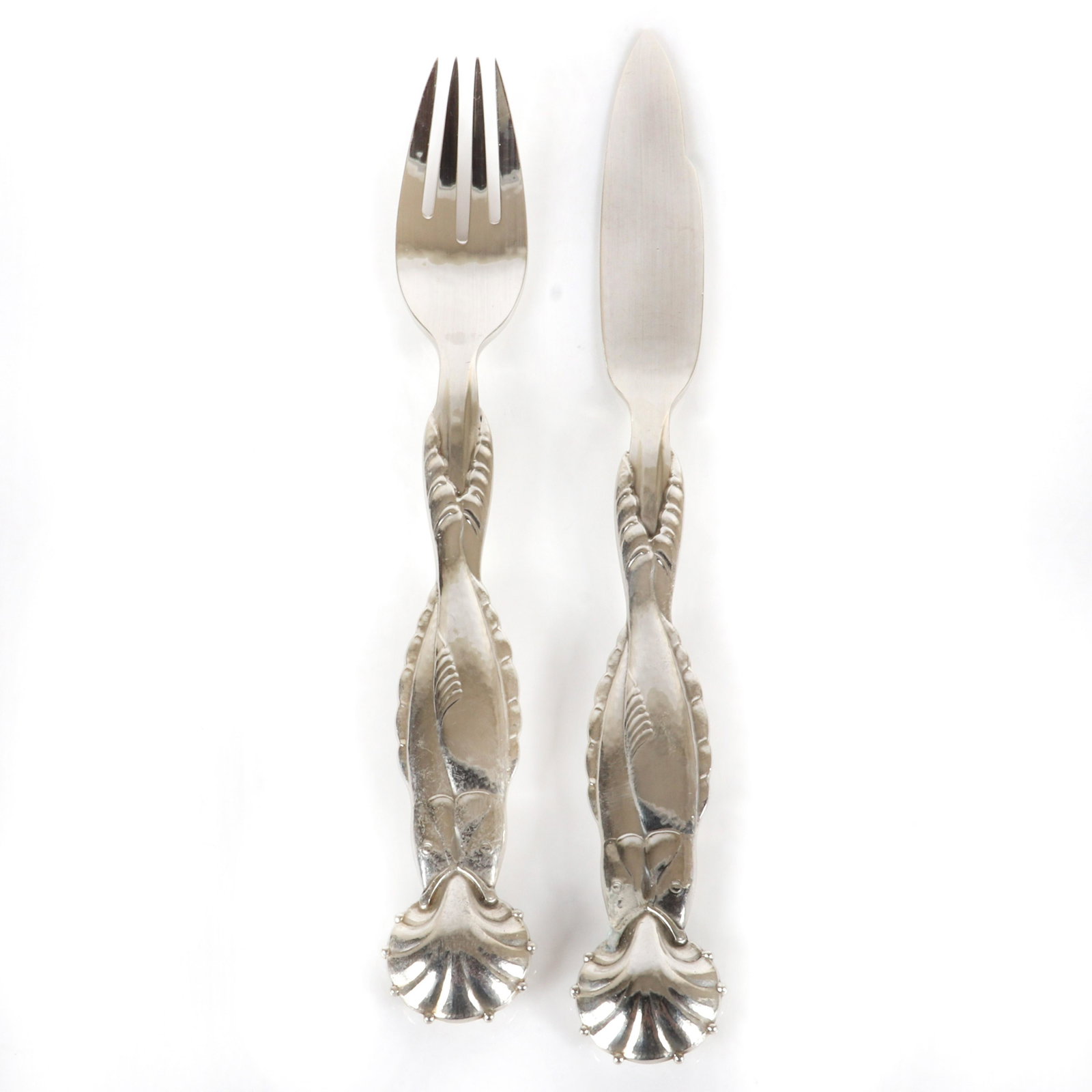 Georg Jensen Dolphin pattern sterling silver fish fork: Georg Jensen Dolphin pattern sterling silver fish fork and knife serving pieces. 8 1/4"L (knife), 3.47 troy oz