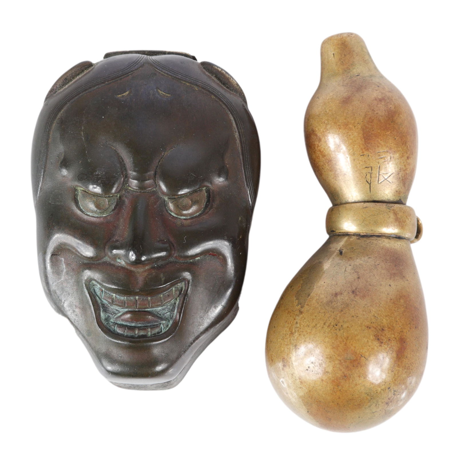 Japanese bronze 2pc.; Noh Theater mask snuff box and: Japanese bronze 2pc.; Noh Theater mask snuff box and double gourd form bottle ornament with threaded closure in the middle and small brush inside, signed on top portion. 3" x 1 1/4" (brush set)