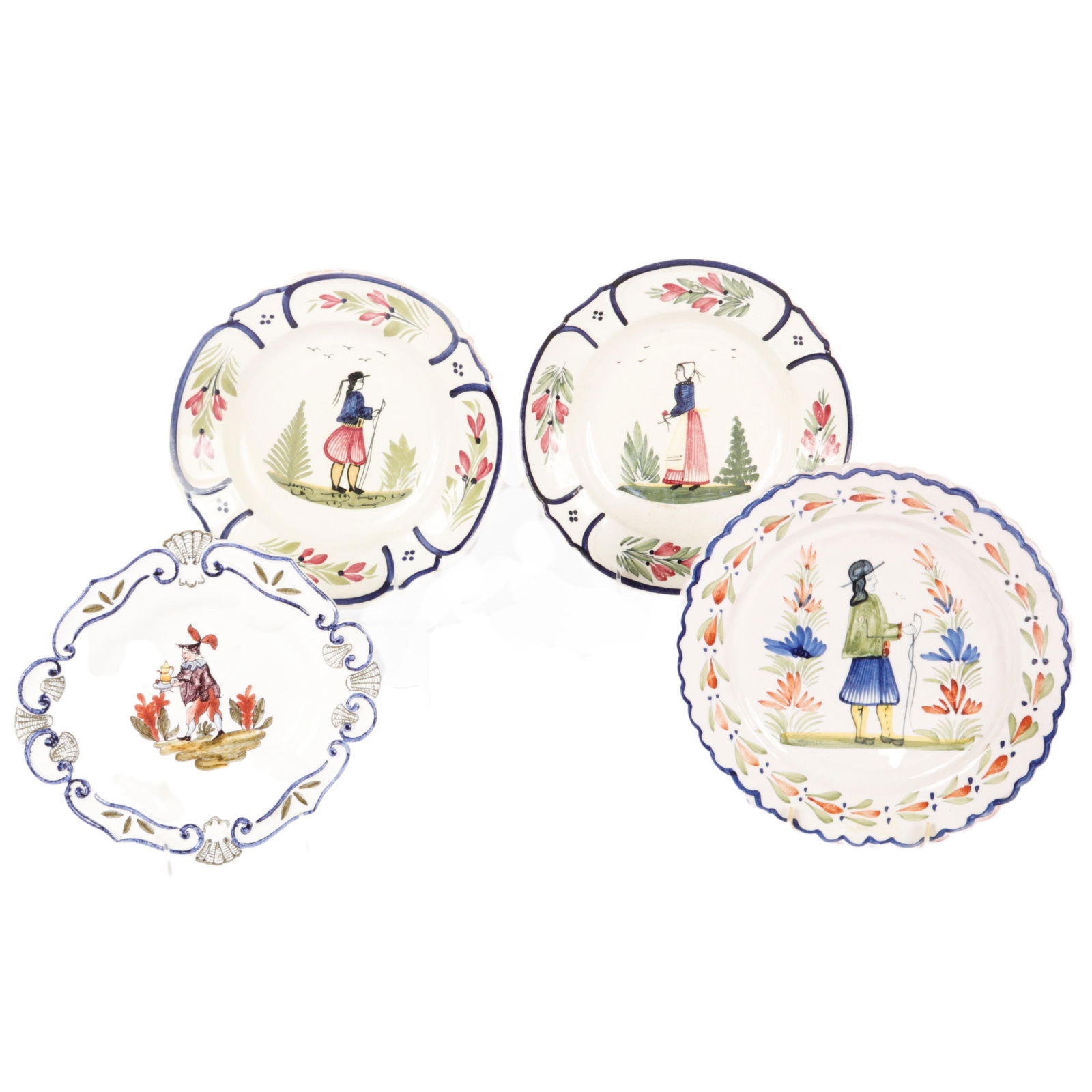 Four pc. painted pottery: two Quimper France two: Four pc. painted pottery: two Quimper France two serving bowls and a platter and French Faience scallop edge serving dish. Chips as shown. 1 1/2"H x 11"Diam. (largest)