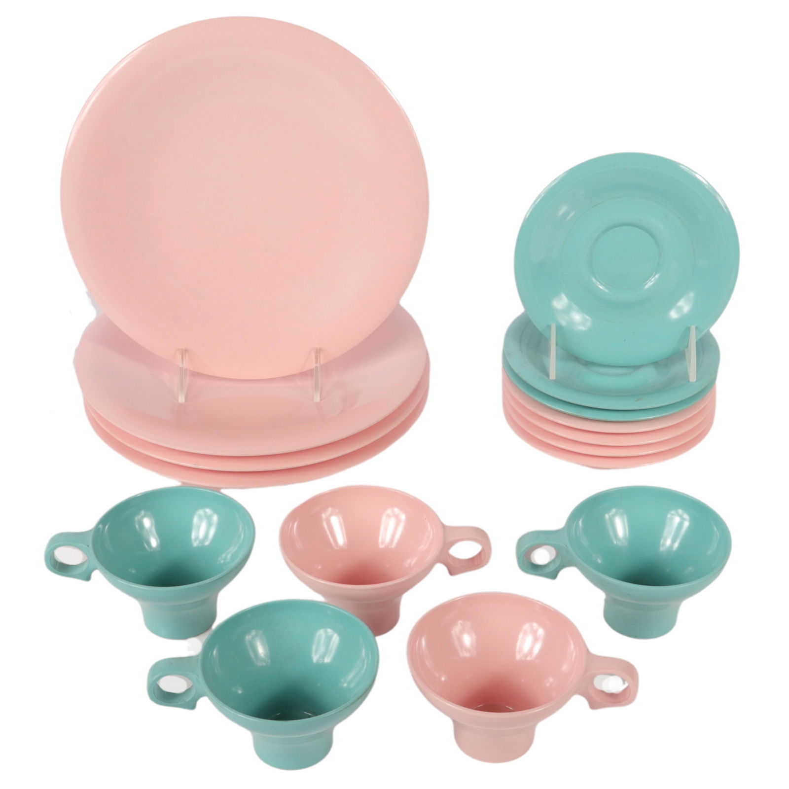 Russel Wright Melmac Flair Pink 16 Piece Service for: Russel Wright Melmac Flair Pink 16 Piece Service for Four; Four each Cup, Saucer, Dinner Plate, and Fruit Bowl. Plates show wear. Also included are Three Turquoise Cups and Saucers. 10"diam (large pla