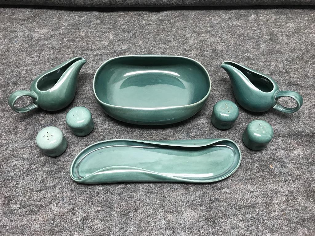 Russel Wright American Modern Seafoam Eight Pieces: 2: Russel Wright American Modern Seafoam Eight Pieces: Oval Vegetable Bowl; Two Creamers; Celery Dish; Two Pairs of Shakers-one salt has glaze flaking due to moisture. 2 1/2"H x 10"W x 8"D (vegetable bow
