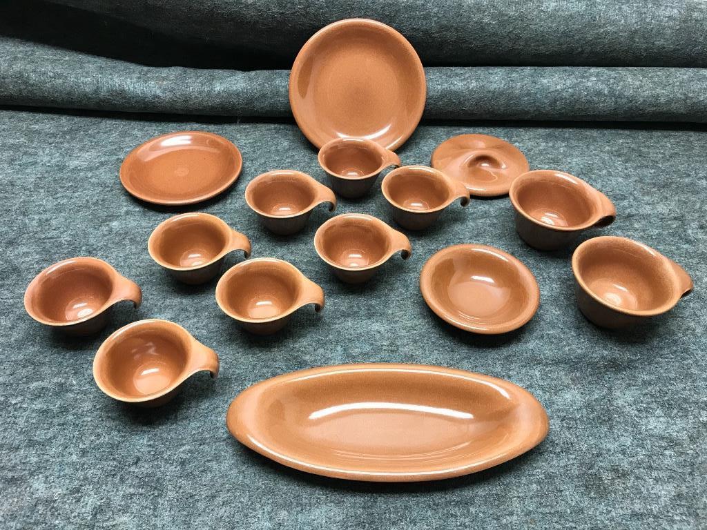 Russel Wright Sterling China Cedar Brown Fifteen: Russel Wright Sterling China Cedar Brown Fifteen Pieces: One 6” Plate; One 7 1/2” Plate; Sugar Lid; Two Cups; One 5” Fruit Bowl; Oval Celery; Eight After Dinner Cups. 6"diam. (plate)